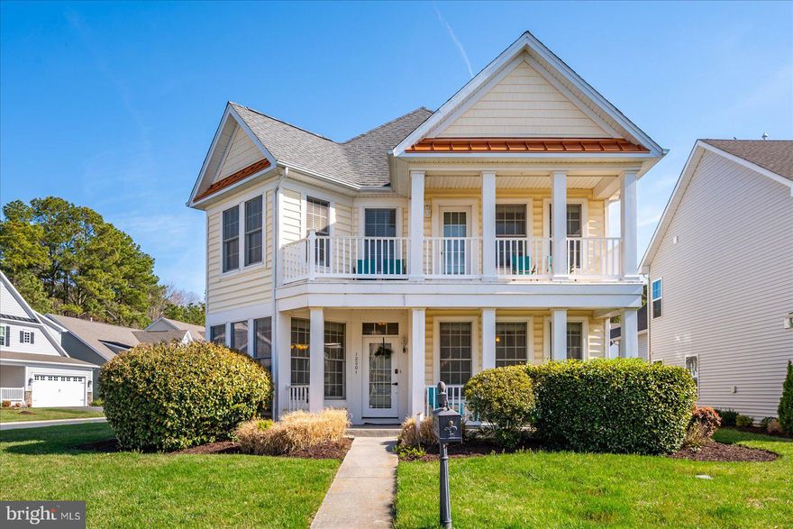 Located on a desirable corner lot in the sought-after Bayside community of Ocean City, this spacious 3,200 sq ft home offers the perfect blend of comfort and coastal convenience—just minutes from the beach, boardwalk, Historic Berlin, golf courses, and Assateague Island. The home features 9-foot ceilings, a first-floor bedroom and full bath, and a bright living room, hardwood floors, and a gas fireplace. The open layout flows into a generously sized kitchen with ample cabinetry, counter seating, and a dining area. A finished third-floor bonus room with a full bath provides flexible space for a second living area or guest suite. Bayside offers resort-style amenities including a crabbing pier, kayak launch, tennis courts, playground, clubhouse, indoor and outdoor pools, fitness center, and billiards room—making this an ideal coastal retreat or full-time residence.