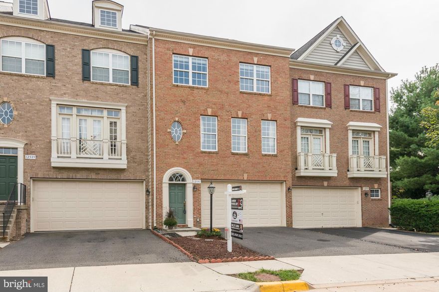 'JUST REDUCED, PRICED TO SELL!!'. Spacious light filled open floorplan Gourmet chef's kitchen w/hardwood floors and huge island. Luxury Master Bedroom w/sitting room and pampering Master bath w/soaking tub. Walkout to your serene paved patio and fenced backyard from fully finished rec room with gas fireplace and bonus storage room.