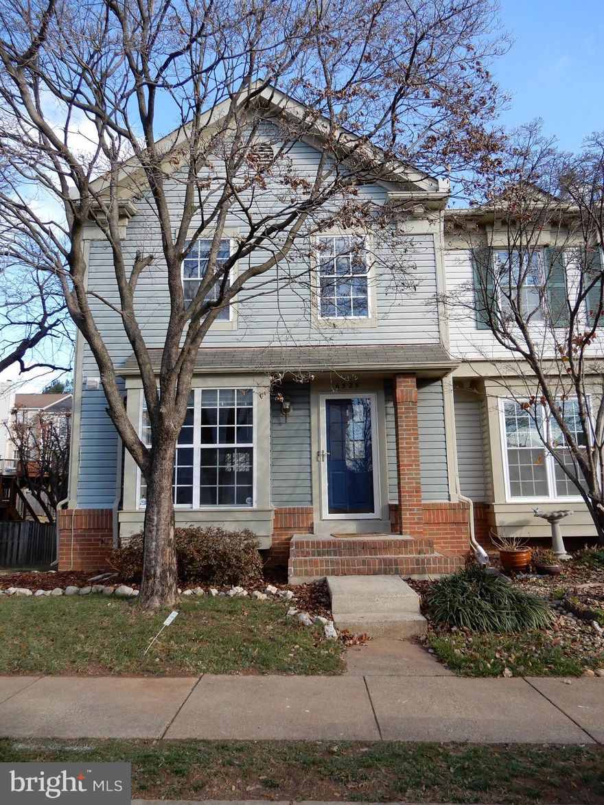 Handsome 3 BR, 2.5.5 Bath End Townhouse all Spruced Up and Ready to Go! * Fresh Paint, Gleeming Hardwood Floors, New Upstairs Carpet, Wood Fireplace, Huge Deck, and Best of All..Clean as Clean Can Be! * This Home is Ready For You! * Fenced Back Yard, Brick Patio, Reserved Parking * Responsible Credit and Good References a Must! * Available Now! *