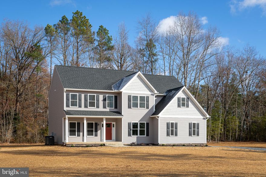 BRAND NEW Custom Colonial on 10 gorgeous acres offering you 4 Bedrooms, living room, dining room, kitchen, family room, main level bedroom or study and two car side load garage. Vinyl and stone exterior, porch, stone surround fireplace, 9 foot ceilings on main level, white/gray cabinets in kitchen, tile in the baths, hardwood floors in kitchen and living room, carpet in bedrooms, garage door openers, and much more.  If you are looking for privacy this one is a must see