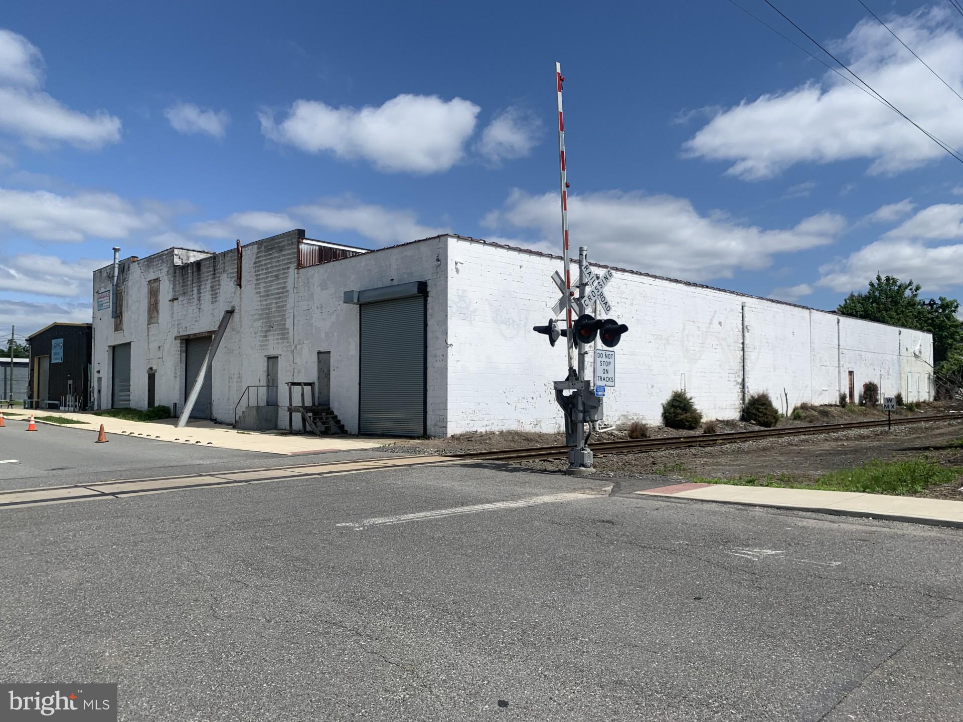 Building available. Bring your vision to this expansive site (there is space for more than one). Desirable location in close proximity to Subaru Park and the Philadelphia Union Soccer Complex. Multiple parcels with possible subdivision opportunity. The current floor plan includes seven (7) units. The Larimer Beer Company and Taproom leases one unit under a month-to-month agreement. The adjacent lot can accommodate approximately 120 vehicles. An executed Hold Harmless Addendum is required for any interior inspection.