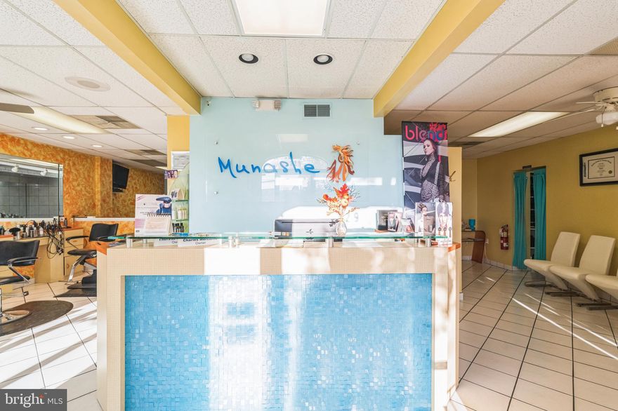 If you are looking for an easy investment without the headaches of doing repairs, remodeling and trying to find tenants, than here it is! With 3 stories and over 3,000 square feet this commercial/mixed use property is for you.  Utilities are separately metered. 
With market rent for the apartment, the building could produce about a nice return on investment. If you have a different vision for this property’s use, don’t fear, there are no leases in place. This could be a great place to live and run a business or whatever you choose to do. The street has a high traffic count and the lot can accommodate 12 vehicle parking. 

Starting with the first floor, we have an upscale working salon with reception and waiting area, multiple stations, therapy rooms, office, powder room and galley style kitchenette. There is also another office in the basement which happens to be dry and kept neat along with the utilities and storage area. For additional storage there is a shed in the back of the parking lot.

The 2nd floor, 3 bedroom apartment is accessed from the rear staircase, which brings you to a large rear deck. There are two glass doors that lead you to the living room with a gas fireplace and sizable modern kitchen along with powder room.
The third floor has a full bathroom nestled between the bedrooms that have vaulted ceilings and skylights.

Everything is up to code as the fire Marshall recently did an inspection.  With most recent U & O complete.
Property has been kept in great condition. Buy with confidence!