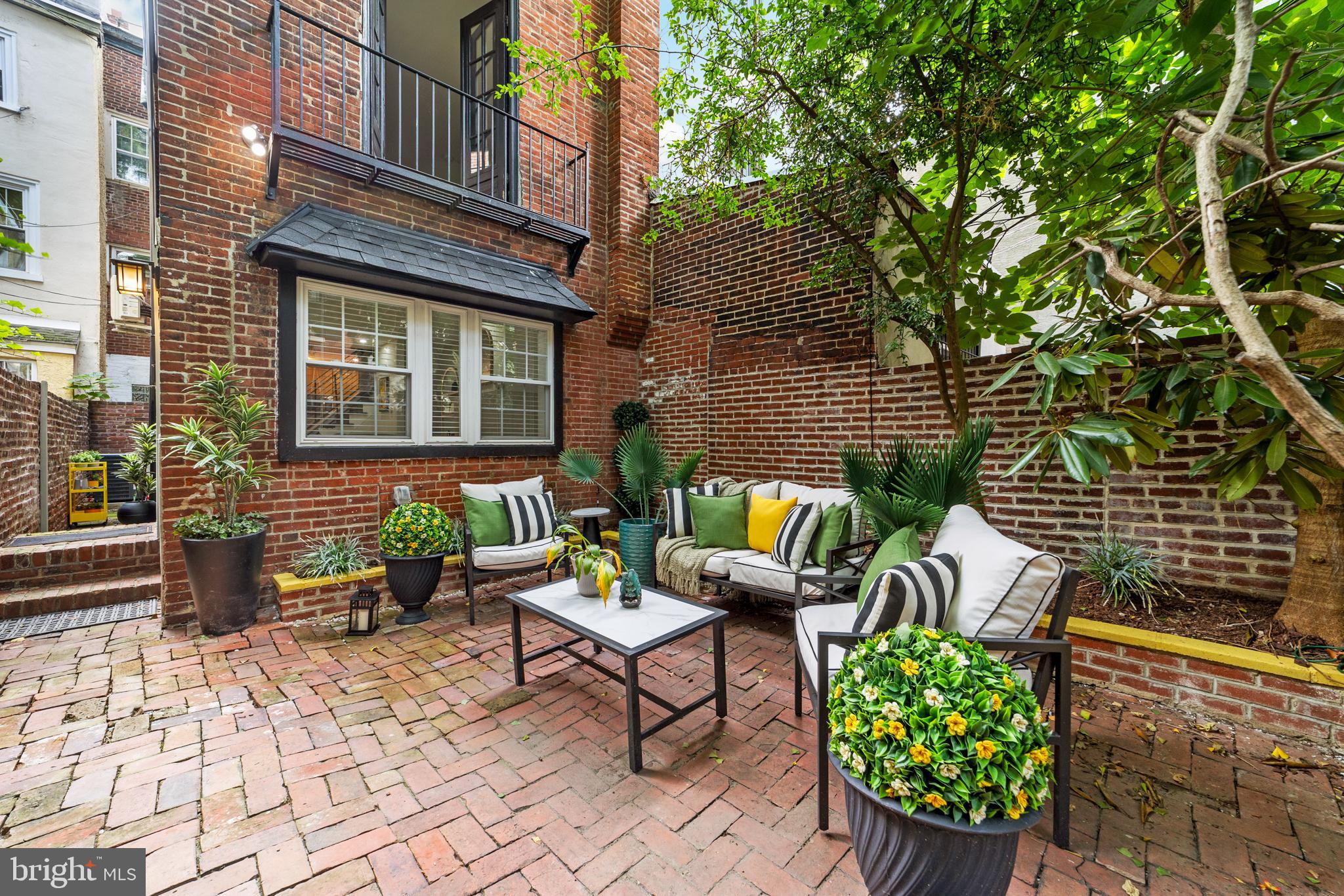 Welcome to 321 South Fawn Street, a historically designated, renovated Townhome, tucked away on one of Washington Square West’s most desirable blocks. This quiet, tree-lined, primarily pedestrian street, feels like a hidden getaway, tucked quietly within the center of the birthplace of America, offering the best of both worlds: a peaceful setting and the convenience of being able to drive right up when needed. From the moment you step through the wrought iron gate into your private courtyard, you’ll know you’ve arrived somewhere special. Inside, the first floor welcomes you with an open layout, beautiful hardwood floors, recessed lighting, and a striking wood-burning fireplace with a modern cement surround as the centerpiece. The modern kitchen includes Bertazzoni appliances, white Carrara marble countertops, and a trash compactor, blending thoughtful upgrades with timeless design. Upstairs, the second floor is home to a light-filled primary Bedroom, featuring a Juliet balcony overlooking the courtyard, custom built-in closets, and a full hallway bath with an oversized shower. The third floor offers two additional spacious bedrooms and a hall bath with a subway tiled tub/shower combo. The partially finished basement adds practicality with laundry, storage, and a half bath. This home has been meticulously updated with major improvements: newer appliances, newer gas Goodman HVAC & Rheem hot water tank, newer roof, newer electrical and plumbing, a newer water line (no lead), newer mini-split units, Hunter Douglas blinds throughout, and more. The level of care and investment here ensures peace of mind for years to come. Step outside and you’ll quickly see why Washington Square West is one of Philadelphia’s most sought-after neighborhoods. Close proximity to Septa public transit stops and (Suburban & Jefferson stops), a play land and dog park for your kids just around the corner, and between the vibrant 13th Street corridor, offering a variety of dining and nightlife options, Washington Square Park which is a peaceful green space rich with history, once a resting place for Revolutionary War soldiers. Around the corner you’ll find the Pennsylvania Hospital, the nation’s oldest, and the Walnut Street Theater, America’s longest-running playhouse. You can stroll over to the South Street Headhouse District, which offers endless dining, music, and art, Whole Foods Market, Antique Row, coffee shops, and public transit (Market-Frankford Line, Broad Street Line, PATCO) are all nearby, keeping the city within easy reach. Whether you’re looking for a move-in ready residence in a prime location or a fully furnished investment property with rental potential, which could be a potential option here as well, 321 South Fawn Street is the rare combination of history, convenience, and modern living. Please take a minute to view the video tour, and then schedule your in-person showing appointment, today!