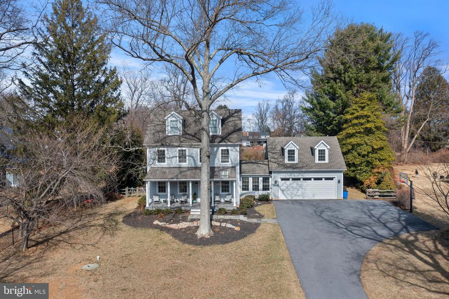 Welcome to Malvern Borough and this classic colonial home with elegant farmhouse influences sitting upon approximately 6/10 of an acre.  Your home greets you with an inviting covered front porch that is sure to be a favorite spot in the warm months for sitting and watching the world go by.  This home features 4 / 5 bedrooms, three full baths and one half bath.  From the moment you enter this home, it greets you with a warm hug.  Nine foot ceilings, dark hand scraped hardwood floors, and warm paint tones throughout.  The first floor features an open concept that will keep the party connected with great room, eat-in kitchen area with fireplace and kitchen.  Just off the kitchen through the sliding doors, is a covered back patio with fireplace and kitchenette area for grilling.  The back patio will definitely be a hot spot for watching fall football games.  The kitchen features a commercial grade eight burner range, with stainless steel appliances and farmhouse sink.  Classic subway tile backsplash taken to the ceiling provides function and a high end detail to the hub of the home.  The island is sure to be the center of any party.  Off the main hallway is a butlers pantry with copper counters and backsplash that leads to the breezeway / mudroom area and provides access to the two car garage. The breezeway also provides access above the garage where there is a fifth bedroom with full bath that can be used as a home office, in-law or au pair suite.
 
The second floor of the home features three bedrooms and two full baths.  The main bedroom features a four piece bath with dual vanities and walk-in closet featuring built in closet organization.  Bedrooms two and three are also located on this floor and share a hall bath.  The third floor features a fourth bedroom that is sure to cause an argument as to who gets this gem of a room with spacious ceiling heights, hardwood flooring and two dormers that flood the room with south facing light. 
 
This home provides easy walkability to Malvern Borough shops, restaurants and parks.  Across the street are Chester Valley baseball fields, Malvern tennis courts, playground and covered pavilion for parties in the park.  Come July, Monument park turns into the annual Fire Department Carnival for a week with rides and games and ends with town fireworks display.  There are two parks that provide outdoor basketball courts.  Our main park features a pavilion that hosts weekend farmers market and our annual tree lighting ceremony to kick off the holiday season.  Our town hall features our Police department and public library.  You will enjoy easy access to the R-5 train (Main Line).  Malvern is truly a Village unlike any other along the Main Line, providing a strong sense of community via little league baseball, Great Valley Community organization basketball league, cheer and football and award winning schools that support music and the arts.  Great Valley Marching band has won the state competition 3 years in a row.  Malvern provides quick access to horse country several private golf clubs as well as private schools if desired. Malvern Borough is not only a great place to live, it's a lifestyle.