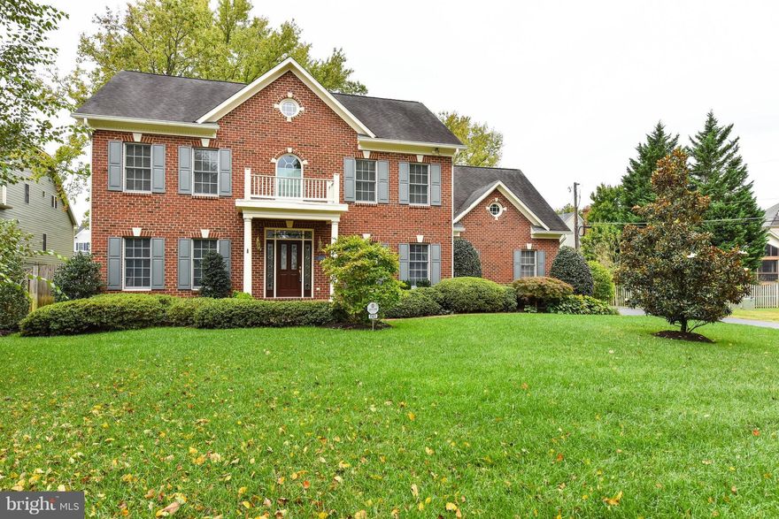 Beautiful custom home, quality craftsmanship sited on private .51 ac. landscaped yard! Gleaming wood floors, 9' ceilings, open floorplan features light filled rooms, gourmet kitchen, main lvl den/guest bdrm, family rm w built-in, gas fireplace. Spacious master bdrm, tray ceilings, walk-in closets, sparkling baths! Whole house generator and sprinkler system. Basement plumbed for bath, 2 car garage!