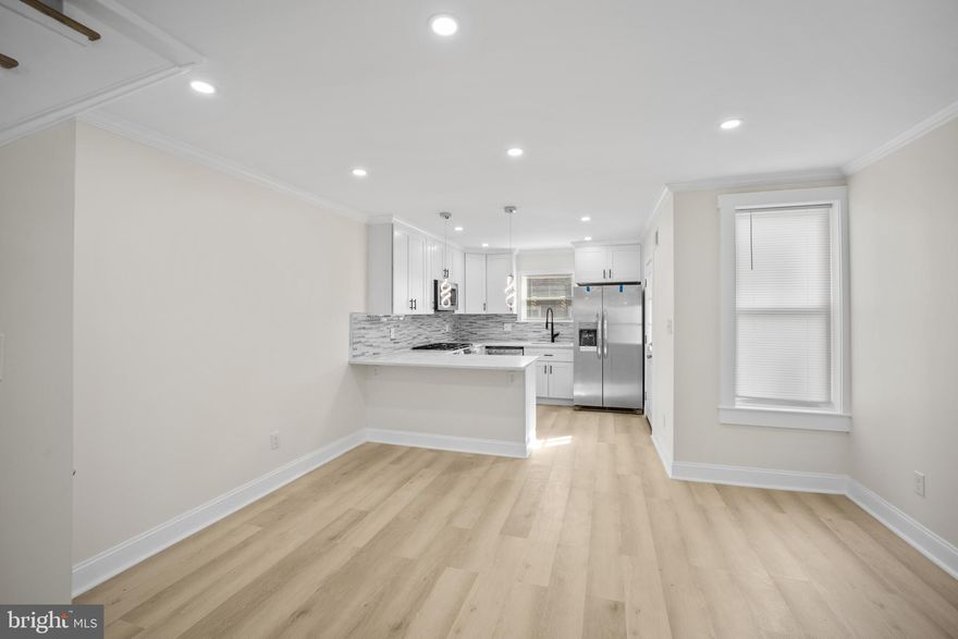 Welcome to this beautifully renovated home that blends contemporary style with practical living. As you step inside, you're welcomed by an open-concept layout that seamlessly connects the living room, dining area, and kitchen—creating a bright and spacious main level perfect for everyday living and entertaining.
The kitchen features sleek granite countertops, all-new stainless steel appliances, and modern finishes, making it a true centerpiece of the home.
Upstairs, you'll find three generously sized bedrooms and a fully updated bathroom with a stylish new shower. Throughout the home, brand-new windows flood each room with natural light while enhancing energy efficiency.
The lower level offers a fully finished private in-law suite with its own separate entrance, complete with a full bathroom and flexible living space—ideal for guests, extended family, or rental opportunities.
Additional highlights include a brand-new HVAC system, ensuring year-round comfort and peace of mind.