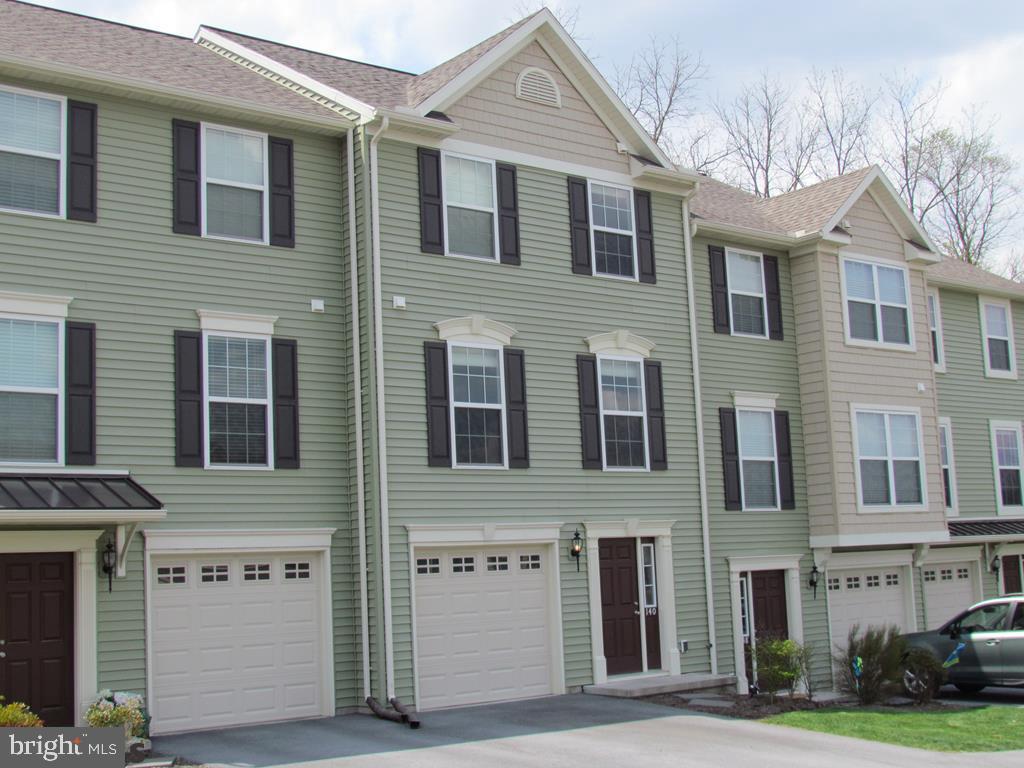 Better than new! 4 year old Wyndham style townhouse in The Gates.3BR, 2.5BA. Lovely entry with hardwood floor and hardwood stairs leading to the main living level. Light and bright eat-in kitchen with granite countertops, stainless steel appliances , and a custom designed island. 1Ox10 deck off the kitchen to enjoy your morning coffee. Main level has hardwood floor throughout kitchen,dining and living room, and convenient half bath with ceramic tile floor.Custom shades throughout main level and second floor.Master bedroom with dramatic vaulted ceiling, walk in closet and full private bath. Two additional bedrooms, full bath and laundry area round out the upper floor. Carpet in bedrooms, ceramic tile in baths and hardwood on stairs and second floor landing. Unfinished storage space with egress window on entry level. Close to historic Boalsburg and the base of Tussey Mountain. Easy access to CATA bus service. Visit Virtual Tour at https://rem.ax/2wnvBVK