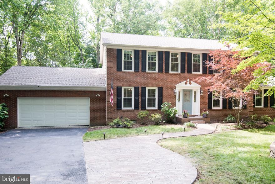 Fantastic home on a private lot with each access to DC, Baltimore & Annapolis.  This home has been updated thruout.  Gorgeous hardwoods on the main level, 2 wood burning fireplaces to keep you warm on those chilly nights.  Updated bathrooms.  Master Shower has multiple body sprays.  All closets have organizers.  Built in custom cubbies in the laundry room to keep everyone organized.  The kitchen has plenty of cabinet space for all of your cooking desires.  Huge deck overlooking your private backyard.  Freshly painted, replacement windows, newer HVAC, driveway recently sealed.  Ready to move right in.  Quick settlement is possible.