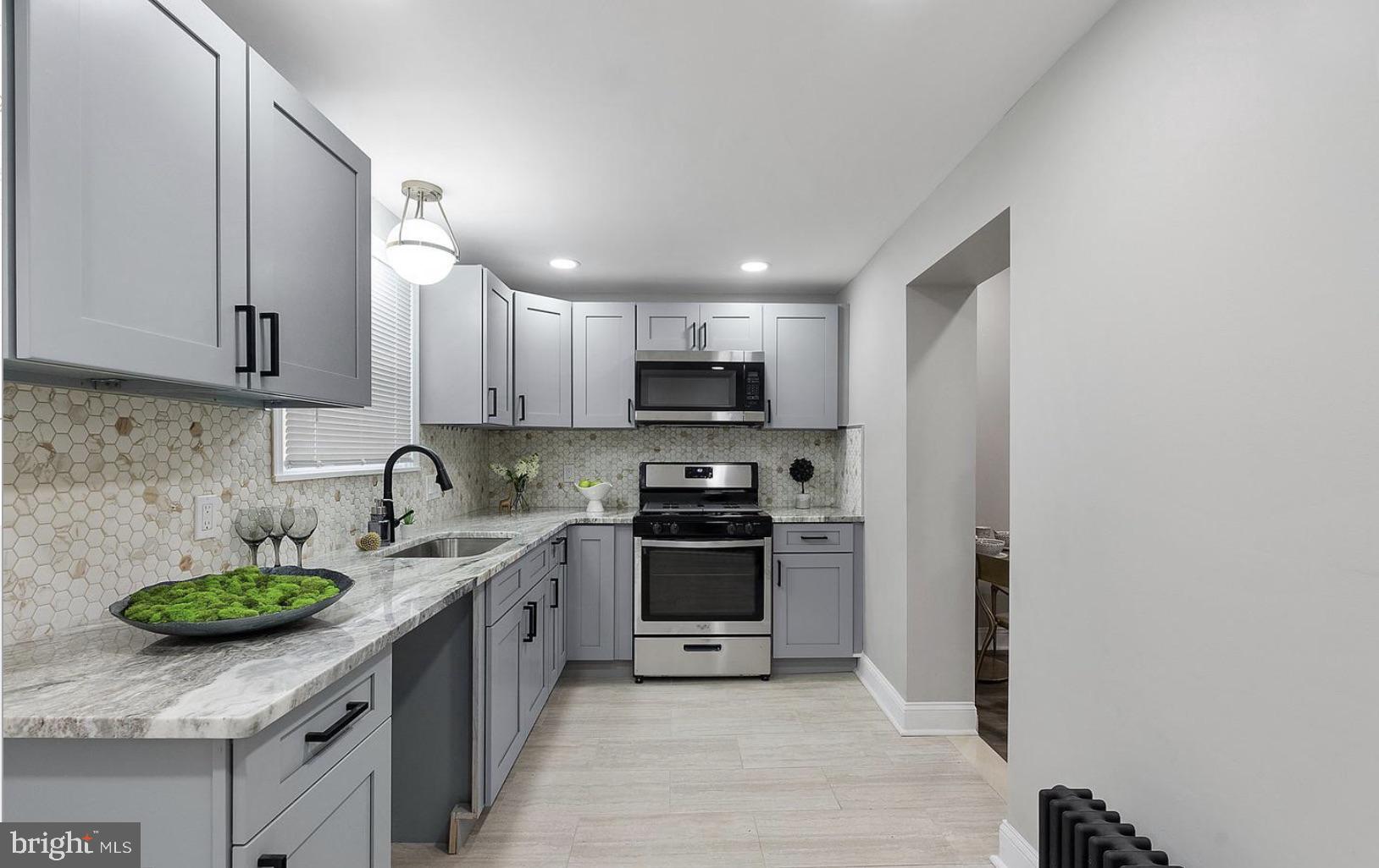 Fully renovated and income-producing duplex located on a quiet block in a high-demand rental area. Each unit offers 2 bedrooms and 1 full bathroom, with #1 tenants currently paying $1,305/month and maintaining consistent payment history. #2 is vacant and ready for an owner occupant or to be leased. Both units feature modern kitchens and bathrooms, well-designed layouts, spacious bedrooms, and ample closet space. Additional highlights include separate utilities, in-unit laundry hookups, a fenced rear yard, and convenient street parking. Recent updates and maintenance ensure low ongoing operating costs. Ideally located with easy access to major highways, public transportation, and employment and educational centers. Whether you're looking to add a reliable asset to your portfolio or occupy one unit while leasing the other, this is a strong opportunity. Reach out for more details—this one won’t last.