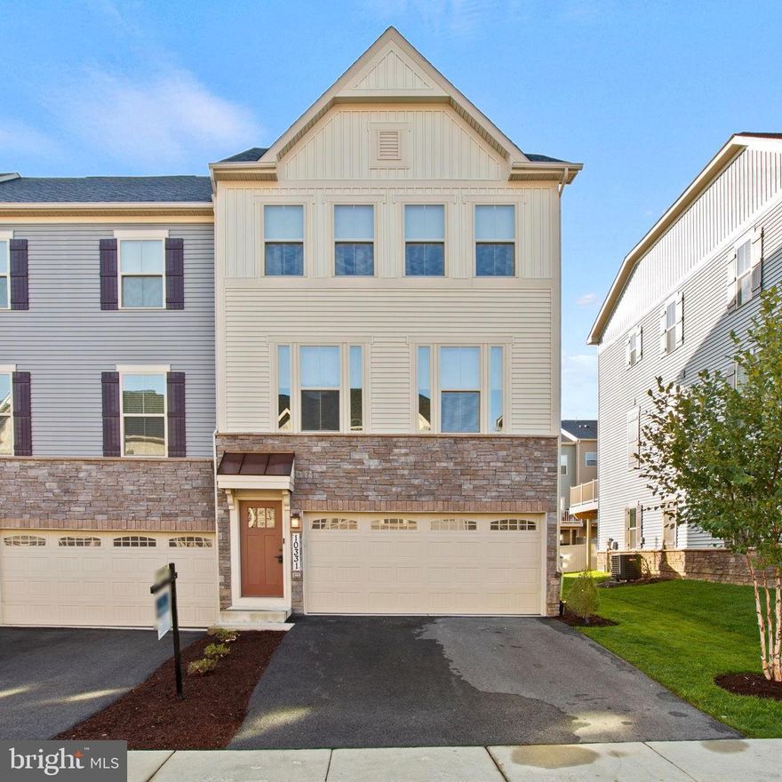Welcome Home to this Nearly Brand-New Townhome in Sought after Lake Linganore Oakdale with TONS of Upgrades! You will LOVE the Light-Filled Open Floor Plan. Enter Through the Front Door to Cascading Steps to Main or Lower Levels. When Entering from Your Two Car Garage,  You Are Welcomed into a Cozy 1st Floor Family Room with Custom Built In Coat Nook , Upgraded High End Wall to Wall Carpets, Full Bath and Sliding Glass Door Access to Paver Patio w/ Beautiful Fenced in Landscaped Back Yard w/ Custom Lighted Sitting Wall.  Just Upstairs You Will Be Wowed by the Gorgeous and Spacious Main Living Level. Enjoy Cooking and Entertaining in the Gourmet Kitchen with High-End Stainless Steel Appliances, Upgraded Cabinets w/Under-Mount Lighting and Upgraded High End Quartz Countertops. The Kitchen is Open to the Dining Area and a Large Living Space w/ Powder Room. The Living Room Opens Through a Sliding Glass Door to a Large Lighted Trex Deck to Expand Your Entertaining Space. The Dining Room that Adjoins the Kitchen has a Wall of Windows , Custom Coffee Bar w/ Glass Cabinets and Mini Beverage Refrigerator.  Upstairs You Will Find the Primary Bedroom Suite with Beautiful Finishes, Tray Ceiling w/Fan, Walk In Closet and Ensuite Bath w/ Upgraded Marble Tile Throughout. Two Additional Bedrooms, a Full Hall Bath and Laundry Area are Also on This Level. Bonuses Include Tons of Recessed Lighting, Ceiling Fans, Custom Window Blinds and Much More.  The Garage Has Also Been Outfitted w/ an EV Charger Outlet (Hookup Ready). The Lake Linganore Community is Vast and Offers a Plethora of Amenities! There is Easy Access to Four Freshwater Lakes with 2 Lakeside Beaches, Tennis Courts, Basketball Courts, 4 Pools, Nature Trails, Parks, Tot Lots and Pickleball Court. The Community also Assigns to the Well-Rated Oakdale Schools and is Convenient to All Commuter Routes, as Well as The Historic Downtown Frederick Area with its Many Restaurants, Shopping and Access to Events. This Home is a MUST SEE!!!