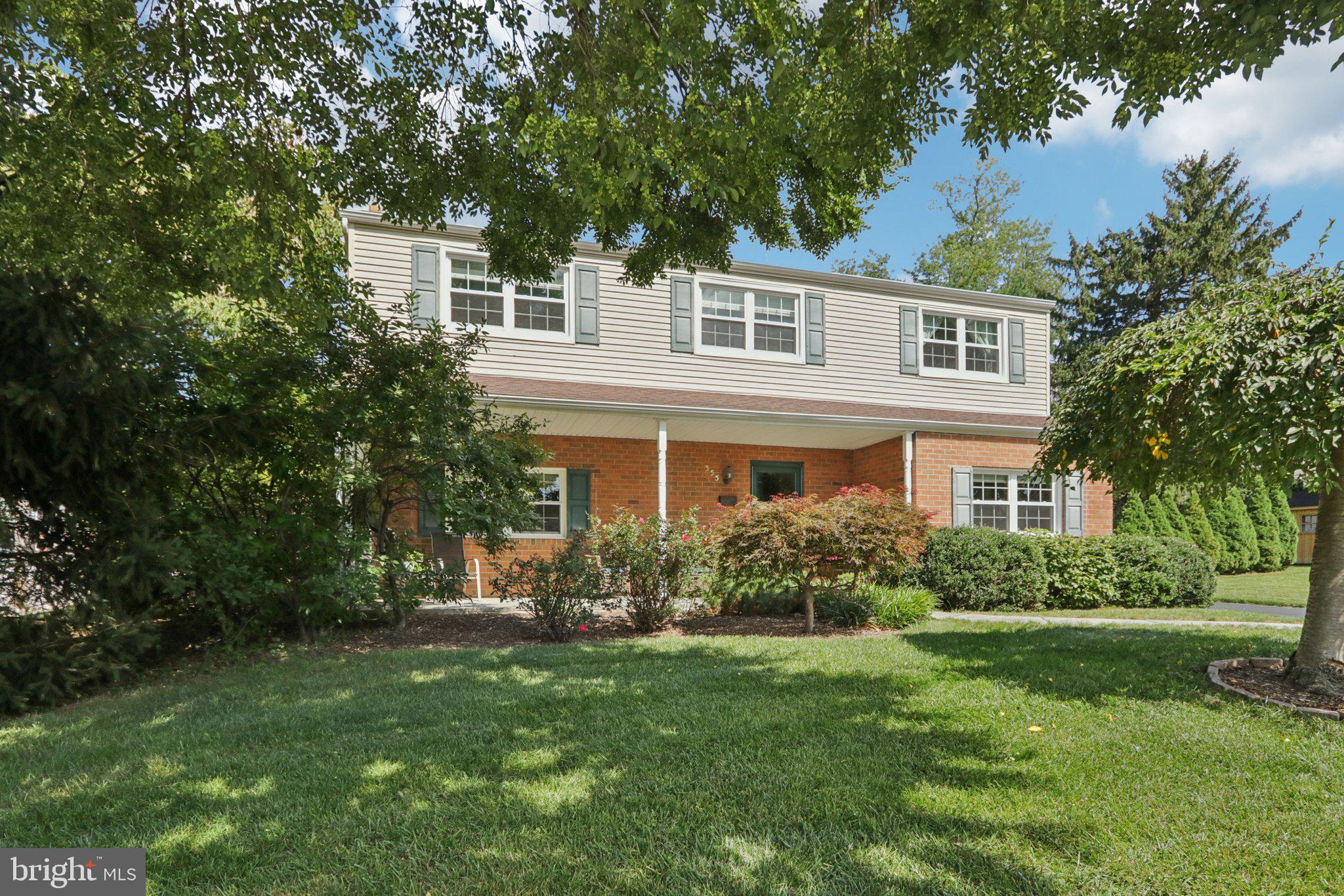 Welcome to 355 Brighton Road, a beautifully maintained colonial in the heart of Plymouth Meeting. This 4-bedroom, 2.5-bath residence offers over 2,200 square feet of comfortable living space, thoughtfully updated and ready for its next owner.
A bluestone walkway leads to the inviting front porch and into the main level, where oak hardwood floors flow throughout. The kitchen features timeless wood cabinetry, granite countertops, and stainless steel appliances. The kitchen has plenty of storage and counter space and also includes a nice sized pantry closet. The formal living and dining rooms provide the perfect setting for everyday living and entertaining. A versatile room currently used as office space adds flexibility, and the highlight of the main level is the stunning family room addition. With arched wood ceilings and abundant natural light, this space is as warm as it is impressive. Just beyond, a spacious stone patio with hot tub offers the ideal retreat for outdoor gatherings and relaxation.
Upstairs, the primary suite has been smartly reimagined to maximize both function and comfort. The ensuite bath features a glass enclosed tiled shower and a stylish vanity, while the custom walk-in closet provides exceptional storage. Three additional bedrooms, an updated hall bath with quartz vanity and walk-in tub, plus a versatile bonus room currently setup as a dressing room complete the second floor.
The dry unfinished basement provides ample storage while the long oversize driveway that fits two cars side by side ensures plenty of parking. A side yard shed offers even more storage for equipment, outdoor furniture and bikes. With recent vinyl double-pane windows enhancing energy efficiency, this home is truly move-in ready. Located in one of Plymouth Meeting’s most desirable neighborhoods and just a short stroll to Plymouth Valley Park, 355 Brighton Road combines timeless charm with everyday convenience.