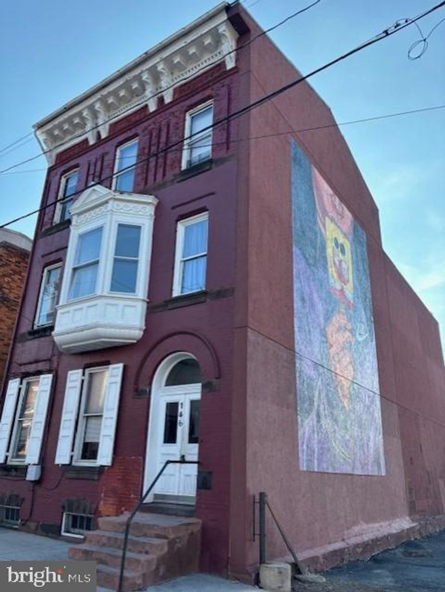 First floor-1 bedroom 1 bath apartment apartment with wood floors throughout. Living room area with high ceilings and kitchen with stove and refrigerator. Access to shared back yard/common area. 1 off-street parking space in the lot across the street. No pets and no smoking indoors.