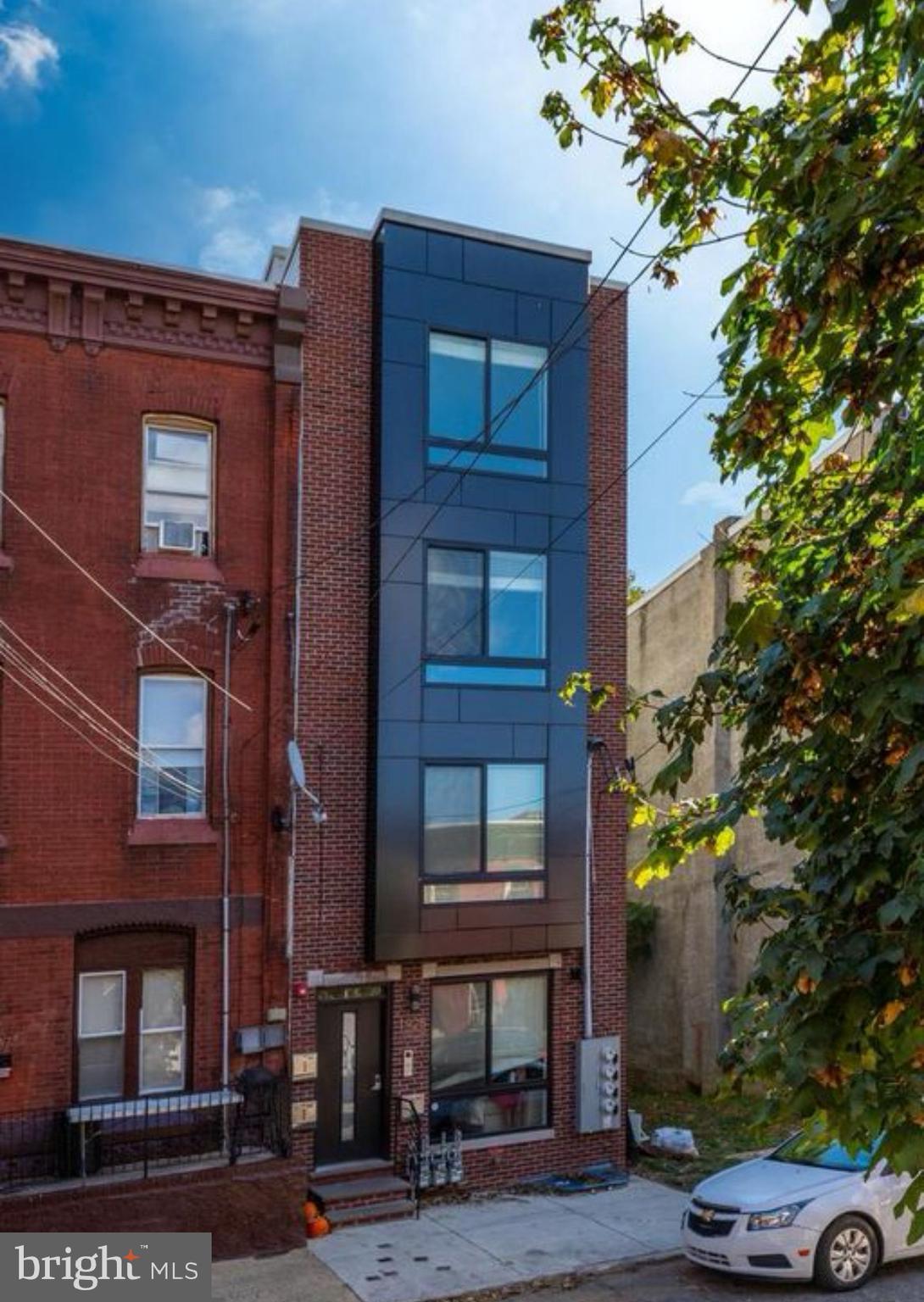 Welcome to 1925 N Marshall St, Unit #1, located in the vibrant South Kensington neighborhood—one of Philadelphia's most rapidly growing areas. This stunning new construction offers everything you need! Boasting an expansive layout, the unit features 3 spacious bedrooms, 2 full baths, and a private backyard—significantly larger than most rentals in the area. Inside, you'll enjoy modern conveniences including an in-unit washer/dryer, an open-concept living area and kitchen, sleek stainless steel appliances, quartz countertops, and ample closet space. The unit is packed with extras such as a built-in surround sound speaker system, a smart thermostat, and a security system for added peace of mind. Situated on a fantastic block with new construction all around, this is the perfect place to call home. Come see it for yourself!
