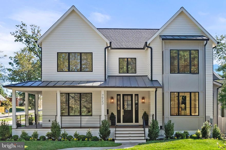 Breathtaking in Bethesda from master builders District495! A showpiece of modern luxury with a quality level of construction rarely seen in Bethesda. Perched in one of Westboro’s most coveted locations, this brand-new luxury residence by District495 blends timeless architecture with modern sophistication. Designed with meticulous craftsmanship and high-end finishes, this home offers an effortless balance of grandeur and comfort with the convenience of downtown Bethesda living and all it has to offer.

Soaring ceilings, floor-to-ceiling windows, and an open, light-filled layout create an inviting ambiance. The living and dining rooms flow seamlessly into a spacious family room, anchored by a striking gas fireplace. Expansive glass doors open to a stunning covered terrace overlooking the flat, private rear yard—perfect for a future pool and outdoor living.

At the heart of the home, the chef’s kitchen is a masterpiece, featuring Wolf and SubZero paneled appliances, quartz countertops, custom cabinetry, signature hardware and lighting, a large pantry, a separate butler’s pantry, and an oversized island ideal for gathering. Thoughtfully designed for effortless entertaining and day to day living, the adjacent eating area and coffee station off of the kitchen lead to the stunning main level half bathroom.  

The owner’s suite is a private retreat, boasting dramatic vaulted ceilings, an oversized dressing room, and a spa-inspired en-suite bath with a soaking tub, rainfall shower, heated floors, marble tiles, and a bespoke vanity. A rooftop terrace offers the perfect escape for morning coffee or evening stargazing. Four additional en-suite bedrooms, a family sitting area, and a laundry room complete the upper level.

The lower level is designed for both relaxation and recreation, featuring an expansive entertainment room with a wet bar, a wellness room, an en-suite guest bedroom, and generous storage.

A side load two-car garage connects through a beautifully designed mudroom, perfect for today’s active lifestyle.

With nearly 6,000 square feet of exquisitely appointed living space designed in partnership with Boxwood Living, this home is built for refined luxury. Ideally located just moments from Downtown Bethesda, BCC High School, NIH, Columbia Country Club, and premier dining and shopping, it offers both tranquility and convenience.

A rare opportunity for the most discerning buyer—welcome to 7923 Chelton Road.
