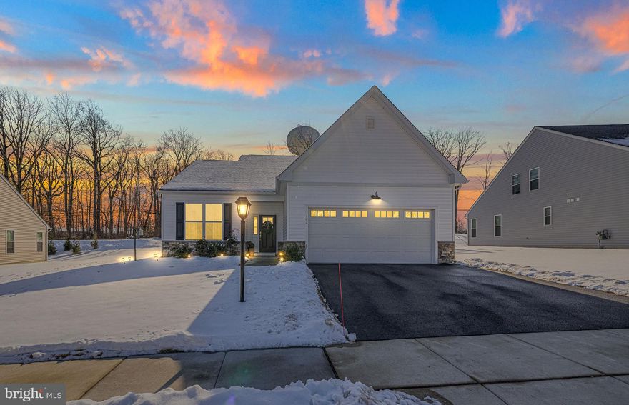 Welcome to 102 Lilac Ct, a ​m​eticulous, turn-key -practically new- former model home in the sought after active adult community of Hillview. This thoughtfully designed layout offers the perfect blend of functionality and style, with tall ceilings and an open floor plan.

​As you enter the home through the spacious entryway, you will find a flex room to the left. While the beams of natural light make this a perfect spot for a home office or fitness room, this flex space could easily be a third bedroom or a formal living room if that suits your needs. Who doesn't love options?

The heart of the home is the chef’s kitchen, a culinary dream featuring stainless steel appliances, a very fancy wall oven that doubles as an air fryer, convection, and more; gas range​ and hood, and dishwasher​, and a built-in microwave. The soft-close cabinets, cabinet and drawer storage inserts, WALK-IN pantry, and beautifully large quartz island really have created the kitchen that dreams are made of! This space offers room for a full kitchen table next to the kitchen, but many neighbors with this layout have used the large space in front of the kitchen or the flex room for more of a "formal dining space"....again...the options are endless.

​The living room is spacious and inviting, complete with an upgraded gas fireplace and tall ceilings. The gas fireplace was thoughtfully installed with a battery backup, so if ever to lose power in a storm you have a backup source of heat! What a cozy space and such easy flow for entertaining!

Tucked privately behind this space is the owner's ensuite. With two large closets with custom shelving and upgraded double bars, you can feel organized and relaxed. The double sink and beautiful walk-in shower with floor to ceiling tile and a bench provides the perfect private oasis. 

​The second bedroom is also spacious and conveniently situated near the second full bathroom, offering convenience when entertaining or hosting guests from out of town. 

 Step outside to the private patio, an ideal spot to relax and enjoy your outdoor oasis.

With recessed lighting and upgraded flooring throughout the home, it makes daily tasks easy breezy. Additional highlights include a laundry room with washer and dryer and thoughtful shelving above, a two car garage with ample storage space, and a smart lock security system for ease of access and peace of mind. 

The home is wonderful- but the community is equally is impressive. With amenities like a clubhouse with a gym, library, game room, and indoor pool and outdoor saltwater pool, a hot tub, bocce ball and pickleball...just to name a few...You have your favorite activities at your fingertips! With a social calendar that is full all year long, it truly provides a sense of community, an array of lasses, and new experiences that you can partake in as much or as little as you like. The walking trails offer a perfect way to experience the community on a beautiful day, and the maintenance is included in the HOA. Additionally, the HOA covers all landscaping and lawn maintenance of each home, snow removal (up to your front door), a neighborhood garden and the picnic areas.

Once you are here, you may never want to leave!! But if you are heading out, this neighborhood is centrally located just minutes from shopping, golf courses, hiking trails, and restaurants. For those with a commute, this community is near major roadways and train stations.

Don't miss your chance to own this charming home, where thoughtful details and comfortable living come together seamlessly. Schedule your tour today!