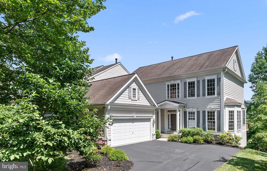 ***OPEN HOUSE CANCELLED****Stunning End Unit Carriage home in arguably the best location in Springton Pointe Woods.  Located at the top of the cul de sac on Arthur Ct, this 5 bedroom with main floor Primary Bedroom Suite has  4.5 baths, and is spacious and light filled and feels more like a single family home! Lovingly maintained by the original owners, it offers soaring high ceilings, hardwood floors and an abundance of natural light. Enter into the two story foyer and you are welcomed by an open floor plan, with an elegant curved staircase, custom millwork and stunning views of the tree tops in the green space.  The dining room is open and airy with a bay window overlooking the yard.  The living room is two stories and features a wall of windows allowing for natural light to stream through and the custom millwork accents the floor to ceiling gas fireplace & surround.  The eat in kitchen is cozy with maple cabinetry and tons of storage, corian counters and marble tile backsplash.  With Gas cooking, a large island, built in pantry and access to the large deck overlooking the trees it will not disappoint. The deck features a motorized awning and a hard wired gas line making outdoor dining and entertaining a breeze.  The Oversized primary bedroom suite  is conveniently located on the Main floor and features beautiful views, a spa-like bathroom with double sink vanity, soaking tub, ceramic tile stall shower, private toilet room, linen closet and large walk in closet. A powder room and laundry room with storage closet are off of the hall leading to the 2 car garage.  Up the curved staircase are three additional bedrooms two of which share a neutral hall bath and the 4th bedroom has a private en suite bath.  A conveniently located upstairs sitting area perfect for a tv area or home office completes the upper floor.  The walk out lower level is a fabulous space offering so many options! It is open and features a sliding glass door to a large paver patio, and a fifth bedroom or private home office with full sized windows and adjacent to a full bath!  A large storage area completes the lower level. Enjoy the low maintenance lifestyle as the HOA takes care of common area maintenance, exterior maintenance, lawn, snow and trash.  All of this is conveniently located close to major highways, Newtown Square Center, Media and all the Main Line.  Whether you are downsizing or looking for a low maintenance lifestyle, don't miss this amazing opportunity!