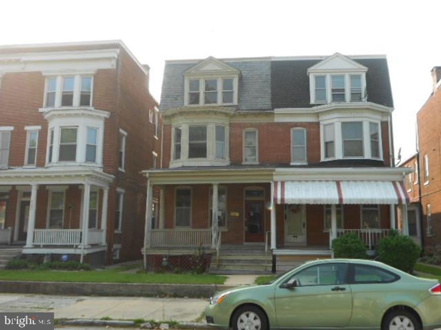 HUD Owned home, boasting 5 bedrooms, hardwood floors, separate Dining Room, large porch, partially finished basement, off street parking available,  plus so much more