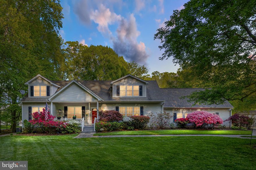 Envision your new lifestyle here at this gorgeous waterfront retreat nestled along the tranquil shores of Lake Anna, Virginia.  This captivating residence offers a rare blend of luxury, comfort, and natural beauty, promising an idyllic retreat for those seeking the ultimate lakeside lifestyle.  Located south of the 208 bridge on the public side of Lake Anna in one of the most desirable subdivisions on the public side of the lake:  Bear Castle at Lake Anna.  High speed fiber internet by iWisp,  You'll fall in love the moment you arrive at this meticulously maintained property as you're greeted by lush surroundings and a  picturesque setting.  Step inside to discover a sanctuary of modern sophistication and timeless charm.  With over 2,700+ finished square feet, 4 bedrooms, 4 full baths, a bonus room, and a half bath in the garage, there is plenty of space for everyone in the family to spread out and relax.  The main level features a living room with a gas fireplace and hardwood flooring that is open to the kitchen that showcases a center island, stainless appliances, and a dining area.  The sunroom/family room has vaulted ceilings, tile flooring and a gas fireplace.  Main level lakeside primary bedroom with an en suite bathroom that has been renovated with a new tile walk-in shower.  There are two additional main level bedrooms and a full bath.  Upstairs, your family and guests will enjoy spreading out in the expansive family room/bonus room with a full bath and relaxing in their own private bedroom with an en suite bathroom.  Outside, an oasis awaits.  Whether you're lounging on the expansive covered porch with heaters or on the patio, this retreat offers the perfect setting for al fresco dining and entertainment. Take a dip in the sparkling waters, or soak in the breathtaking views from the covered boathouse with an electric lift, that has composite decking, a partially covered sun deck and storage room. There is also a place to dock your jet skis.  Approximately 100+/- ft of shoreline and good water depth.  Lake-fed irrigation, shed with electric, and an outdoor shower.  Every moment spent outdoors is a testament to the unparalleled beauty of lakefront living.  The perfect lake location and just minutes to local dining, marinas, groceries, Lake Anna Taphouse and many other breweries & wineries. Nestled on .93 acres and the HOA is optional to join here.  Short term rentals are permitted here!  This home is in perfect condition and the lake lifestyle awaits you here!  Come see for yourself and fall in love.  Some furniture and furnishings can convey.  See list in MLS documents.