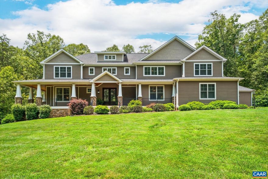 Experience luxury living in this stunning Craftsman-style home set on over 5 acres, complete with a beautiful saltwater pool. The main level features exquisite leathered granite countertops, while the terrace level boasts elegant quartz finishes.  The gourmet kitchen is a chef's dream, equipped with a double oven, coffee bar, wine fridges, and ample cabinetry with under-cabinet lighting. Enjoy entertaining on the expansive covered decks that wrap around the home, accentuated by a custom stone fireplace in the open living area.  Upstairs, you'll find four spacious bedrooms, while the main level offers a luxurious primary suite. The terrace level serves as a perfect Airbnb or in-law suite, complete with a bedroom, living room, full kitchen, and private entrance.  A grand entrance with double doors and soaring 24-foot ceilings sets an impressive tone. The property includes a five-car garage, a walk-in mudroom, and a versatile loft space ideal for a theater or gym.  With 6 bedrooms, 4.5 baths, and high-end finishes, this exceptional home offers endless potential for stylish living and entertaining?just minutes from downtown Charlottesville. Don?t miss your chance to own this luxurious retreat!,Granite Counter,Quartz Counter,White Cabinets,Fireplace in Family Room