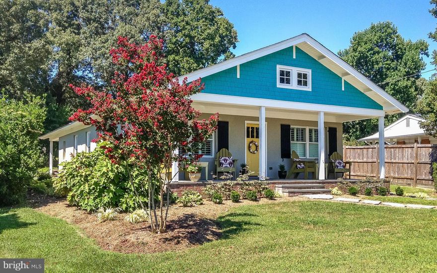 Dream cottage with charm & water privileges! Covered front porch opens to one-floor living with multiple entertaining and working spaces. 2007 Green renovation: Energy efficient VOC drywall, spray insulation, efficient HVAC & appliances, energy star windows & doors, Ice-stone counters & island, hardwoods, reclaimed doors in pantry. Patio & Fire Pit. Two-car garage. Multi-beaches on Severn River.