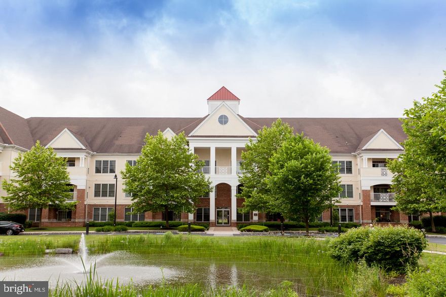 Welcome to 4219 Meridian Boulevard – a stunning condominium in the highly sought-after Meridian of Valley Square, Warrington’s premier 55+ community. This -2nd floor Executive VI model offers nearly 1,800 sq. ft. of thoughtfully designed living space, including 2 spacious bedrooms, 2 full bathrooms, and a versatile bonus room perfect as a third bedroom, den, or home office.
Step inside and you’ll immediately appreciate the seamless blend of open concept living with distinct, defined spaces—thanks to soaring 9 ft. ceilings and elegant half-walls. The inviting foyer opens to a formal dining room and a bright, expansive kitchen featuring stainless steel appliances with gas range, granite counters, counter-height island with extra storage, and a bar-height eat-in ledge with seating for three. A convenient wet bar with sink and cabinetry extends the entertaining space.
The open living room boasts recessed lighting, an electric fireplace, and sliding glass doors to your private balcony. The luxurious primary suite offers a private sitting area, two closets, and a spa-like ensuite bathroom complete with dual sinks and oversized stall shower. On the opposite side of the unit, you’ll find the second bedroom, the flexible bonus room (possible office or den), a full hall bath with tub/shower, and a laundry room with stacked washer/dryer and utility sink.
Additional features include a separate storage locker on the 1st floor and a private 1-car garage with inside access.
Living at Meridian of Valley Square means more than just a home—it’s a lifestyle. The community clubhouse offers a gathering room, card room, billiards, library, fitness center, kitchen, and an outdoor pool. Best of all, you’re just a short walk to Wegmans, Michaels, T.J. Maxx, restaurants, and all the conveniences of Valley Square.
This is truly low-maintenance, high-enjoyment living at its finest! Schedule your private tour today.