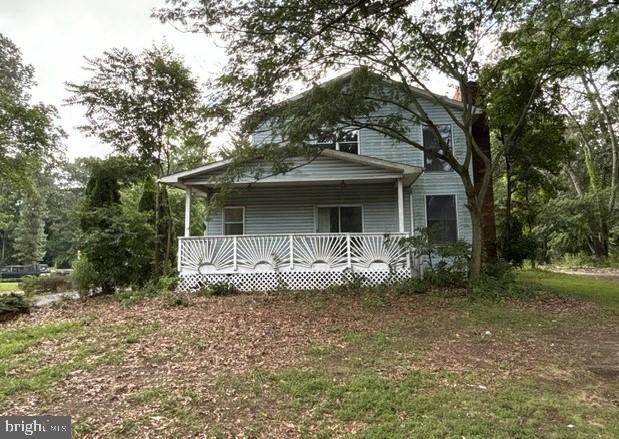 Investment opportunity. This home needs renovation and it is your gain. It has 4 oversized bedroom's and 3.5 bathrooms sitting on almost an acre. The living room and dining room share a vaulted ceiling and fireplace. The primary bedroom is located on the first floor. Build the deck that you want on the rear of the home.