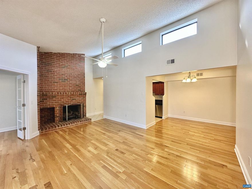 Beautifully renovated top-floor one bedroom condo with solarium. High vaulted ceilings let in lots of natural light. The condo was renovated to the highest quality with hardwood floors, cherry cabinets, granite countertops, stainless-steel appliances, and ceramic tile. The solarium off the living room can be used as a den, office, library, craft room, or even a spare bedroom. The living room also features a wood-burning fireplace with an extensive brick hearth. The covered porch overlooking Turtle Creek is the perfect place to relax after a long day. There is abundant storage throughout the condo including walk-in closets in the bedroom, a storage room off of the porch, a coat closet, a pantry, and a separate laundry room with a full-size washer/dryer. Kitchen features range, refrigerator, microwave, dishwasher, and garbage disposal.   Luxury condo living on Hydraulic Road, right next to the Shops at Stonefield! . Turtle Creek is an established community with all the amenities: 2 swimming pools, 2 tennis courts, playground, fitness room, clubroom, and walking trails. Per the HOA no pets are allowed.,Cherry Cabinets,Granite Counter,Fireplace in Living Room