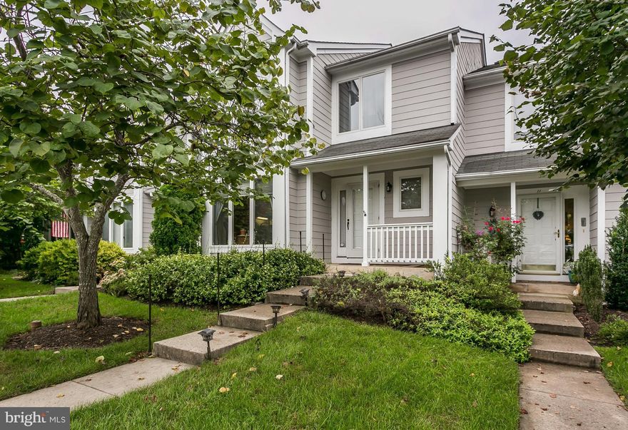 Rarely available 3bd/3.5ba townhouse in the sought after community of Ashland.  Backs to the NCR trail and HOA common area w/ a tranquil setting.  Hardwood floors on main level and up the stairs.  Dining Room is open to Living Room w/ wood burning fireplace and a deck off the back.  Fully finished basement w/ wood burning fireplace, full bath and deck off back. Vaulted ceilings in master and lots of sunlight. Don't miss this rare opportunity to back to the Trail.