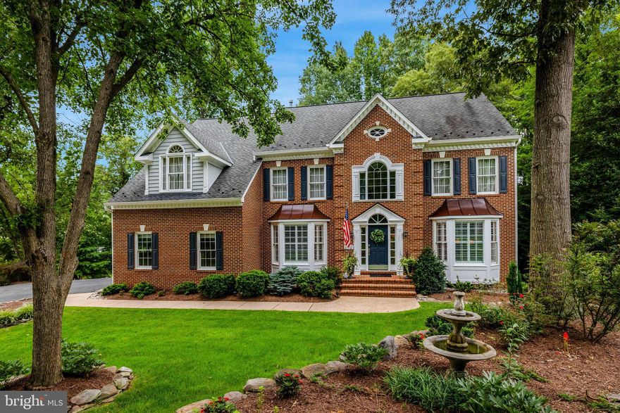 OPEN HOUSE THIS SATURDAY 9/6 AND SUINDAY 9/7 FROM 2-4 PM! PRICE REDUCED $25K!!! Discover this  gem just off the beaten path in Oakton, VA. This stunning Colonial home boasts 4 bedrooms, 4.5 bathrooms, and sits on a serene 0.59-acre lot with over 5200 sf backing to 11 acres of picturesque parkland.

Step inside to an inviting open floor plan that perfectly balances spaciousness with functionality. The main level features a grand entry foyer, complimented by a traditional living room and formal dining room, both adorned with elegant plantation shutters. The expansive kitchen is a chef's dream, equipped with stainless steel appliances, abundant storage, and a breakfast area. Enjoy seamless indoor-outdoor living with direct access from the kitchen to the screened-in porch and deck. The family room, adjacent to the kitchen, showcases a magnificent floor-to-ceiling brick fireplace. Completing the main level are a well-appointed office, a convenient mudroom with laundry facilities, and a stylish powder room.

Upstairs, discover four spacious bedrooms, including a luxury primary suite-your private retreat- featuring an en suite bath, gas fireplace, two sitting areas, and three generous closets. Two  bedrooms are connected by a Jack & Jill bath, while the fourth enjoys its own private full bath. Abundant closets and storage spaces are thoughtfully placed throughout.

The walkout lower level offers additional living space with a large recreation room featuring the third gas fireplace, a den, a full bath, a utility room, and an unfinished storage area.

This home includes an attached, side-load, two-car garage and is beautifully sited to capture stunning views of a private backyard oasis. Ideally located between Vienna, Oakton, Tysons Corner, Fairfax Corner, and Reston Town Center. It offers exceptional convenience.  Commuters will appreciate the proximity to both the Vienna and Reston Metro stations. Situated within the sought-after Flint Hill, Thoreau, and Madison School Pyramid!

This move-in ready home is a must-see! Don't miss the opportunity to make it your own!

Recent Updates include: 
Brand New Cooktop, Microwave/Oven, & Paint throughout
Refinished Floors: 2023
Refrigerator: 2024, Water Heater: 2023, Washer and Dryer: 2021, Dishwasher: 2019