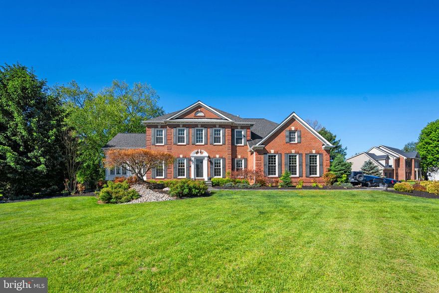 Welcome to this beautifully maintained NV Homes Moreland model located on a picturesque 2-acre lot in the highly sought-after Brookeville Farms community in Brookeville. The main level features hardwood floors, extended crown molding, and thoughtfully designed living spaces ideal for both everyday living and entertaining. A formal dining room and powder room complement the spacious layout, while the gourmet eat-in kitchen offers a large center island, quartz countertops, custom tile backsplash, Wolf induction cooktop, KitchenAid stainless steel double ovens, GE Profile French door refrigerator and microwave, and KitchenAid dishwasher. The kitchen opens seamlessly to a dramatic two-story great room with a floor-to-ceiling stone fireplace and French doors leading to a large Brazilian hardwood deck overlooking the beautifully manicured backyard. A stunning two-story sunroom with French doors opens to an additional deck, creating even more space to relax and entertain, while a private office and a mudroom/laundry room with access to the two-car garage complete the main level. <br> <br>

Upstairs, the spacious primary suite features a cathedral ceiling, two walk-in closets, and a luxurious bathroom with soaking tub, separate shower, water closet, double vanity, and heated floors. Three additional generously sized bedrooms with large closets and a full hall bath provide comfortable accommodations for family and guests. <br> <br>

The finished lower level expands the home’s versatility with a spacious fifth bedroom, full bathroom, dedicated gym, recreation room, and multiple storage areas. Nine-foot ceilings on all three levels enhance the home’s open and airy feel throughout. <br> <br>

The property’s curb appeal is highlighted by its sprawling two-acre setting, meticulously landscaped front yard, flagstone walkway, and newly updated front porch. The backyard offers two decks and beautifully maintained gardens, creating a peaceful outdoor retreat perfect for gatherings or quiet enjoyment. Major improvements include a new roof and gutters (2019), all windows replaced (2013), updated kitchen finishes, renovated bathrooms, multiple HVAC system upgrades, a 75-gallon water heater (2021), sump pump (2018), replaced well pump, fresh interior paint throughout, and brick mailbox pillars with limestone slabs.  <br> <br>

Homes in Brookeville Farms are set on two or more acres and feature wide sidewalks ideal for jogging, dog walking, or leisurely strolls through the neighborhood. The location offers convenient access to shopping, dining, and everyday amenities in nearby Olney, with easy connections to the Intercounty Connector (ICC/MD-200), I-95, and I-270 for commuting to Washington, DC, Baltimore, and surrounding employment centers. Lovingly maintained and thoughtfully updated, this exceptional property offers space, comfort, and timeless appeal in one of the area’s most desirable communities. Schedule your tour now!