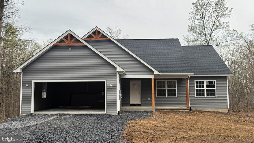 Professional photos will follow once the home is farther along in construction. Stunning New Construction on 3 Acres in New Market, VA! Welcome home to 412 Secession Ln., New Market—a beautifully crafted new construction nestled on 3 private acres. This thoughtfully designed home offers an open floor plan, perfect for modern living, with 3 spacious bedrooms and 2 full baths.

Step inside to find a bright and airy living space that flows effortlessly into a stylish kitchen,  ideal for entertaining. The primary suite is a true retreat, featuring a walk-in closet and an en-suite bath with a double sink vanity and walk-in shower. A convenient laundry room adds to the home's practicality.
Need even more space. The unfinished walkout basement comes equipped with rough-in plumbing for a future bathroom—offering endless possibilities for expansion.

A 2-car garage provides plenty of storage, while the expansive acreage invites outdoor recreation, gardening, or simply soaking in the peaceful setting.

This is your opportunity to own a brand-new home on a private wooded lot conveniently located just 4 miles from I-81. Don’t miss it! Make it yours today and have the possible option to pick out some of the remaining finishes.