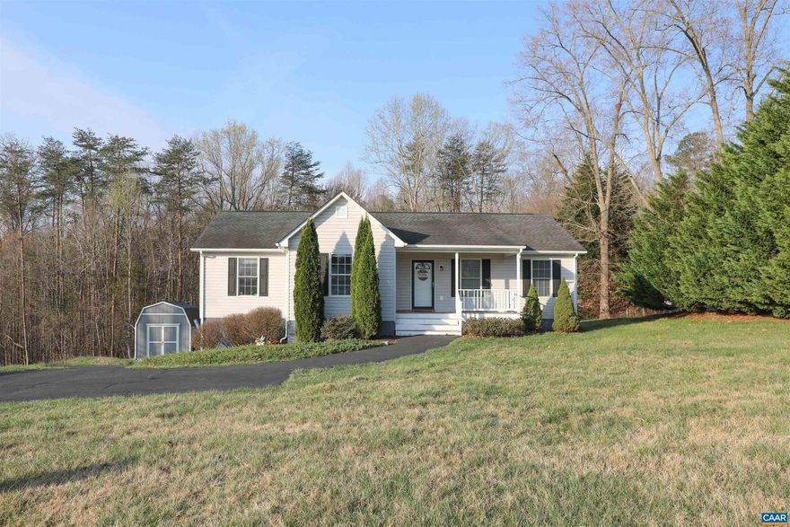 More photos coming soon! Beautiful and spacious home located in the desirable Sterling Heights neighborhood right off route 29, close to Charlottesville. Located on a quiet, large lot with wooded views and a trickling creek in the backyard. You'll love everything this home has to offer. On the first level you find 3 bedrooms, 2 full bathrooms, vaulted ceilings in the Livingroom and kitchen with lots of natural light. In the basement you will find a completely finished in-law suite or bonus recreational space featuring a full kitchen, breakfast bar, open concept living space, full bathroom and another spacious bedroom as well as a separate laundry room and unfinished storage space. This home has all you need and more! Come see for yourself!,White Cabinets