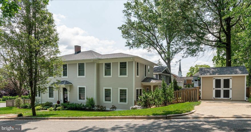 FABULOUS NEW PRICE!!!  Open Sun 2p-4p! 200 W Monroe Avenue is a breathtaking residence that artfully marries early‑20th‑century charm with contemporary luxury, nestled in the highly coveted Rosemont neighborhood. Built in 1910 and renovated and expanded in 2022, this 5‑bedroom, 4.5‑bath home now delivers over 3,700 sq ft of sophisticated living space, all while preserving its historic character.


The main level boasts 9-ft ceilings and rich hardwood floors throughout, complemented by plush carpet in the lower level. A spacious foyer greets you, leading into an open-concept kitchen/dining area ideal for entertaining. The chef’s kitchen showcases high-end stainless steel appliances, an oversized center island with breakfast bar, and a generous walk-in pantry complete with a coffee bar, custom shelving, and built-in wine fridge. An adjacent family room centers around a cozy gas fireplace, creating a warm ambiance. The formal dining room, with built in book cases, is versatile and spacious with French glass doors that open to a luminous office or sunroom—perfect for both productivity and relaxation. Built-in speakers throughout the main floor (Sonos-compatible) enhance the home's elegant sophistication.

Ascend to find four spacious bedrooms and three full bathrooms. The primary suite is a sanctuary featuring: a luxury walk-in closet with soft‑close drawers, custom lighting, mirrors with fine woodwork by Capitol Closet Design, and a spa-inspired ensuite bath with dual marble sinks and a glass-enclosed walk-in shower with a rainforest showerhead. One secondary bedroom offers a private ensuite, while two others share a well-appointed hallway bathroom.

The lower level is designed for both second-family living and entertaining, to incluce a rec room flowing into a second family room, a fifth bedroom with a full bath—perfect for guests or in-laws, and a laundry room. 

Set on a prominent corner lot, the property features a charming picket fence enclosing the backyard and side yard—ideal for pets and outdoor activities. Rare for this neighborhood, there is off-street parking for one vehicle (two if compact) and a covered side entrance, ideal for unloading groceries or toddlers directly into the family room, and a large shed built with electricity, perfect for entertaining or storage. 

A short 6-minute drive or 20-minute walk takes you to King Street Metro Station, conveniently servicing both the Blue and Yellow lines — perfect for commuters. And located near the historical and vibrant districts of Old Town and Del Ray, enjoy a diverse selection of top-tier eateries, boutiques, and year‑round community events.

This area provides the quiet stability of a residential enclave with the cultural, historical, and urban conveniences of central Alexandria.