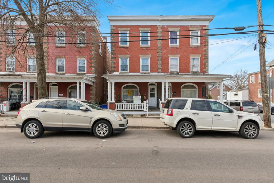 Classic charm meets modern convenience in this spacious 4-bedroom, 1-bath twin home located in the heart of Pottstown! With 1,904 sq. ft. of living space across three levels, this home is ready for its next owner to bring their personal touch.
Step onto the covered front porch, perfect for morning coffee or unwinding in the evening. Inside, the living room’s gleaming hardwood floors and original woodwork set a warm and inviting tone. A spacious dining room and kitchen offer ample cabinetry and workspace. The second-floor hosts three bedrooms, while the third floor provides a fourth private bedroom, ideal for an office, guest suite, or creative space. Throughout the home, you'll find original doors, wood details, and a charming (closed-off) fireplace that adds character.
Outdoor enthusiasts will love the fully fenced rear yard, providing space for relaxation, gardening, or entertaining. Located just minutes from parks, schools, downtown shopping, and dining, this home also offers quick access to major highways, making trips to Philadelphia, New Jersey, and New York a breeze. Whether you’re looking for a starter home or a great addition to an investment portfolio, this home is full of opportunity! Schedule your showing today!