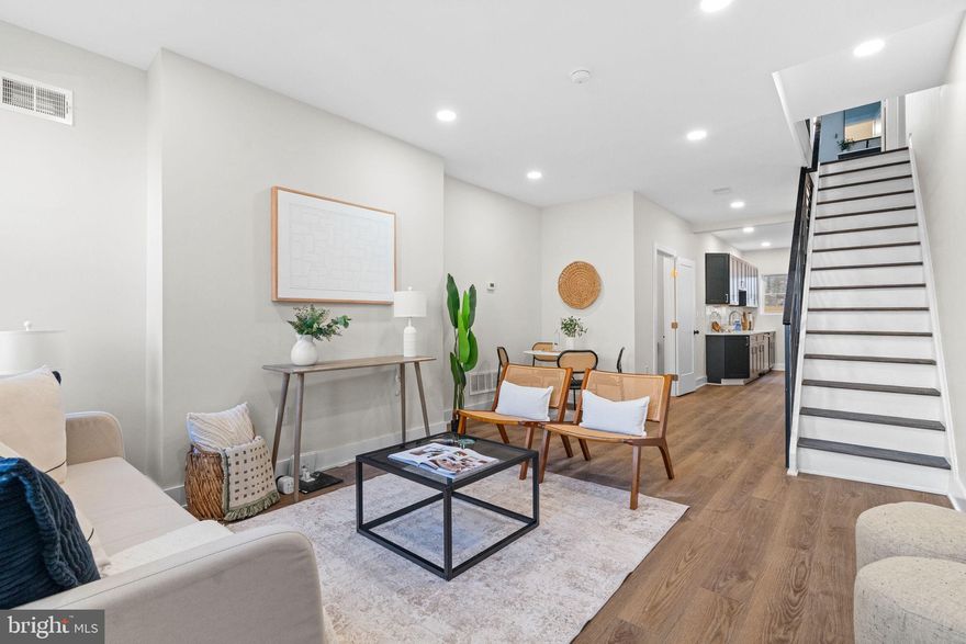 Large 3 bedroom, 2 full and 1 half bathroom home now available. Upon arrival, you'll notice a well kept block and ample street parking on the exterior. From there, a free flowing open concept boasting all natural light, half bathroom, modern kitchen, dining and living room combination on the main level. Next, 3 bedrooms, 2 full bathrooms and tons of closet space upstairs. And finally a finished basement and fenced in patio perfect for entertaining friends and family! Could it get any better though? It does! This home also has a new roof, hot water heater, electric, plumbing, windows, flooring and appliances throughout. In addition, its near all the public transportation you need to make the commute a breeze so hurry and make your appointment today before it's too late!