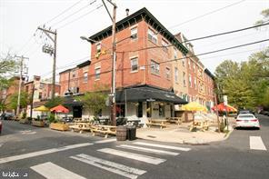Phenomenal opportunity to own a neighborhood landmark in one of Philly's best locations. Investors or owner operators alike will recognize the rare chance to take possession of a building that represents a generational asset. The ground floor bar restaurant was gut renovated from the basement up to the main floor about 16 years ago and is virtually turnkey. It offers a full kitchen, sit down and bar service, outdoor seating and small bandstand and is currently vacant. The buyer will be responsible for purchasing their own liquor license. Square footage of the restaurant space is 3074 sf (including the full basement). The four 1 bedroom apartments are rarely vacant so contribute a reliable and predictable income stream to the investment or the owner/operator of the bar restaurant. The current owner offers 2 free laundry rooms to the residential tenants so additional revenue is possible if a new owner chooses to install coin operated units. There is also substantial upside with the residential rents. With cosmetic improvements to the apartments the rents could go as high as $1900 a month. Make your appointment today. You will not be disappointed.