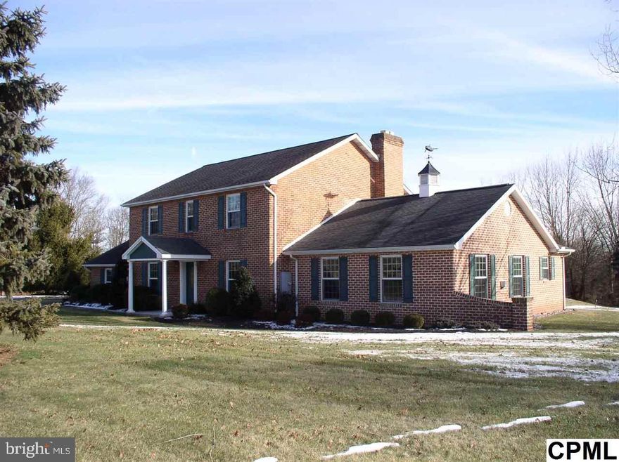 Escape the Ordinary! Serene setting and lush landscaping accent this outstanding home on 6.6 Ac. Custom built to allow the natural beauty of the exterior to be enjoyed throughout . Sunshine floods the great rm, fab cherry kitch w/fireplace, 1st fl master suite w/ luxury bath & gas fireplace , Bonus theater/game rm on LL ,  all w/over 4500 sq ft of living space. Beautiful inground pool & gazebo for summer relaxation !!