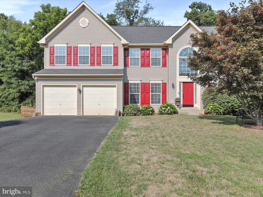 Welcome to 361 Sawgrass Dr., nestled in the sought-after golf course community of Locust Hill in Charles Town, WV! This lovely brick front colonial residence offers the perfect blend of elegance and comfort. This home has only been occupied by the original owners! They have made many upgrades over the years. Upon entering, you are welcomed by an open 2-story foyer with lots of natural sunlight. The main level includes a nice size office with double doors, a large living room and dining room, gorgeous fully remodeled gourmet kitchen with an island stovetop, and a huge family room with a gas fireplace creating a warm and inviting focal point for gatherings with loved ones. The laundry room, complete with sink, a half bath and entrance to garage are also on the main level. The upstairs level has 3 spacious secondary rooms with large closets and full bath. At the other end of the hallway are double doors leading into an enormous primary suite complete with a sitting room, large walk-in closet and a second set of double doors leading into a large primary bathroom with separate shower, soaker tub, double vanity and water closet. In the basement is an open area perfect for a game room/family room, a kitchenette, full bath and a flex room large enough for a movie room or whatever your heart’s desire. There is also plenty of storage space on the lower level which has a walk up to get to the backyard. This home also includes a water softener! Bonus: Roof replaced 2019,  Water Heater replaced 2022, Kitchen remodeled 2023 - original appliances except stove top which was purchased in 2023. 1st Floor flooring replaced in 2023, Carpet replaced in 3 of the bedrooms, fresh paint in 2023. Basement face lift in 2023 (new paint, carpet, cabinets painted, and bathroom floor replaced). You do not want to miss this one, especially if you love to golf! Schedule your tour today!