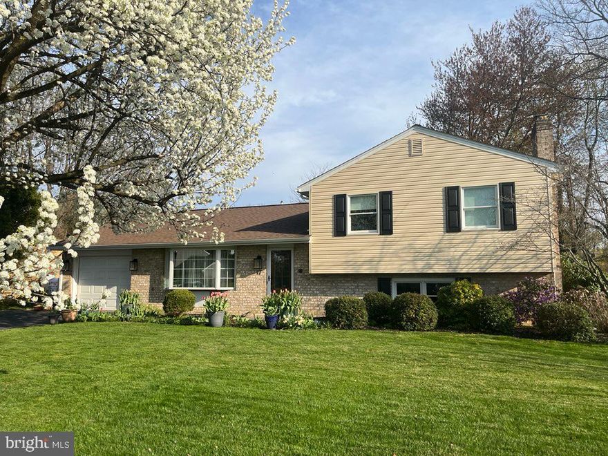 Discover this beautifully maintained 3-bedroom, 2-bath split-level home, perfectly situated
in a quiet, established suburban neighborhood. With its inviting layout, this home is truly move-in ready. Step into the inviting living area, that flows seamlessly into the country kitchen and out to the spacious new 26’x16’ Trex Deck, ideal for entertaining or enjoying peaceful mornings.  Upstairs, you'll find three comfortable bedrooms, including a master suite with private bathroom. The split-level design offers a cozy family room highlighted by the brick fireplace, laundry room, and home office with outside access.  The need for extra storage is provided by the lower-level basement. Take note of the many recent upgrades which include all doors and windows, heat pump, new roof, and vinyl siding. Enjoy the convenience of a prime location in Mechanicsburg Area School District while tucked away in a tranquil neighborhood setting.