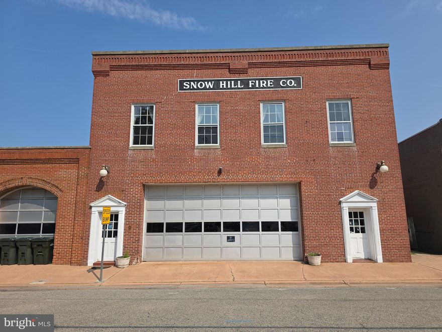 Snow Hill's Historic Fire House features all the charm and functionality of large garage bays, meeting rooms, office spaces, and plenty of plumbing and electricity to support many different uses. Located right in the historic downtown. Near shopping, restaurants, bars, and in the middle of the town's usual festivals and events. This is the perfect location to bring your business, your service company, and your dream. This property has so much potential for development into a possible mixed-use, commercial/residential division into smaller units, a possible brewery, restaurant, or lodging. Come with your own idea, or explore the space and craft your concept; either way, if you miss this space, you may regret it. Snow Hill is open for Business.