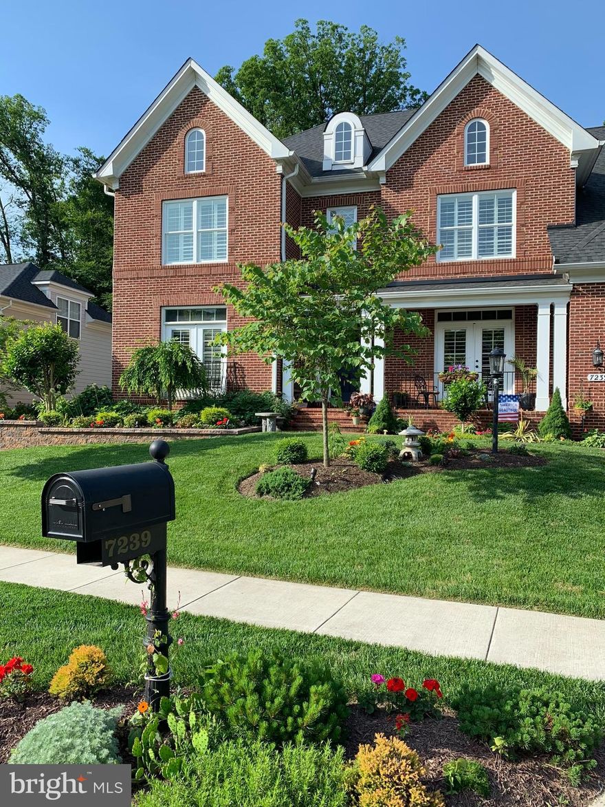 Welcome to this beautiful, 3-finished level, 2012 Built "Oxford" Model at The Reserve at College Heights.  Built by Evergreene Homes with over 6,200 sq. of designer finishes throughout, this home truly has it all! Nestled in the center of this newer College Heights Estates community, yet surrounded by matured trees and expert landscaping, this contemporary Colonial will exceed your expectations. A front covered porch welcomes you into an open foyer that leads to a spacious home office with custom built-ins.  Just beyond, you'll find a generous living room with custom woodwork, fireplace, media closet, coffered ceiling and built-in and shelving with custom lighting. A separate formal dining room with butler's pantry, and a "chef's delight" gourmet kitchen featuring a gas range with pot filler, marble backsplash, granite counters, double wall ovens, oversized center island and a spacious pantry allows for perfect entertaining spaces.   An adjoining breakfast area with doors to a gorgeous deck with hot tub and gas for grilling, is perfect for outdoor parties or relaxing in your own private backyard. A powder room, a mud room with washer, dryer, utility sink, cabinetry, shoe & coat cubbies and a standalone ice machine leads to the fully finished, two-car garage with auto opener. The upper level features a primary bedroom retreat, complete with dual walk-in closets and an en-suite bathroom that features a separate soaking tub and shower and three additional bedrooms (one with it's own full bath and two with a buddy bath.)  A beautifully finished lower level boasts a recreation room with wet bar, walk-up exit to the rear yard, the fifth bedroom with full bath and walk-in closet, a work out studio, a generous storage room and a mechanical room.  Handscraped hardwood floors, raised vanity counters & toilets, crown molding & wainscotting, central vac, ceiling fans,  custom window treatments, custom woodwork, upgraded electric, ....and so much more!  Adjacent to the University of Maryland College Park Campus with sports and cultural activities for all ages and easy access to all major commuter routes (495, 295, 50), Metro (College Park & Purple Line) Whole Foods, Trader Joes, restaurants and parks. No HOA!