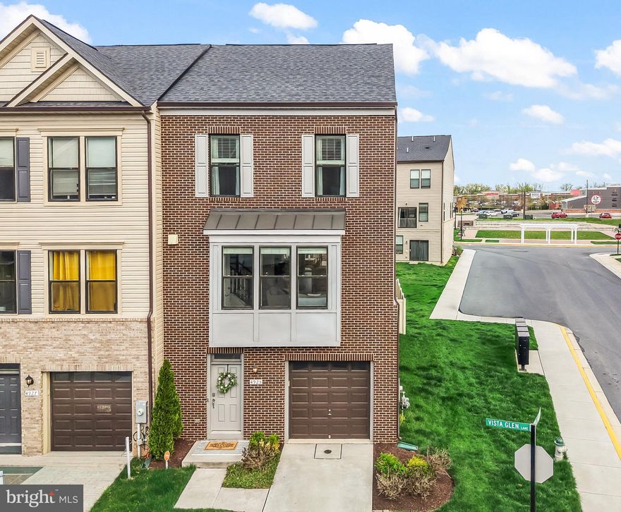 Spacious, bright end-of-row townhome with garage offering the look and feel of new—without the new construction price tag. Built just six years ago, this newer construction home delivers modern design, abundant natural light, and an exceptional sense of space across four thoughtfully designed levels. For eligible VA buyers, an ASSUMABLE VA mortgage at 2.5% presents a rare opportunity long-term savings. Designed for both everyday living and thoughtful outdoor enjoyment, this home features three outdoor living spaces—including a fully fenced yard, a main-level deck, and a loft-level balcony—creating seamless options to relax, entertain, or take in sunset views. Inside, the entry level offers a welcoming recreation room with a full bath and direct access to the fenced backyard—ideal for guests, flexible living, or a private retreat. The main living level is sunlit and open, designed as the heart of the home, connecting indoor living with the deck for an effortless flow. Upstairs, two additional bedroom levels continue the home’s sunlit, airy feel, with beautiful hard-surface flooring throughout. The top level includes the large third bedroom, playroom or flexible space with access to the balcony—an elevated extension of your living space. Comfort meets efficiency with a dual-zone HVAC system providing quiet, balanced climate control across all four levels. Details like bedroom-level laundry and primary suite walk-in closets add convenience, functionality, and peace of mind. Ideally located just 2 miles from MD-50 with convenient access to I-495 and I-95, offering an average 30-minute drive to either Washington, DC or Annapolis. Key military bases are located within 20-40 minutes, including Joint Base Andrews, Fort Meade and Joint Base Anacostia-Bolling.  Everyday conveniences are within easy reach, including Bowie Town Center and Woodmore Towne Centre, both 10–20 minutes away. Outdoor recreation is close to home with Glenn Dale Park and its aquatic facilities just 5–10 minutes away. Commuters will appreciate access to New Carrollton Metro within 15  minutes, while Northwest Stadium, home of the Washington Commanders, adds to the area’s entertainment appeal. Floorplans coming soon.