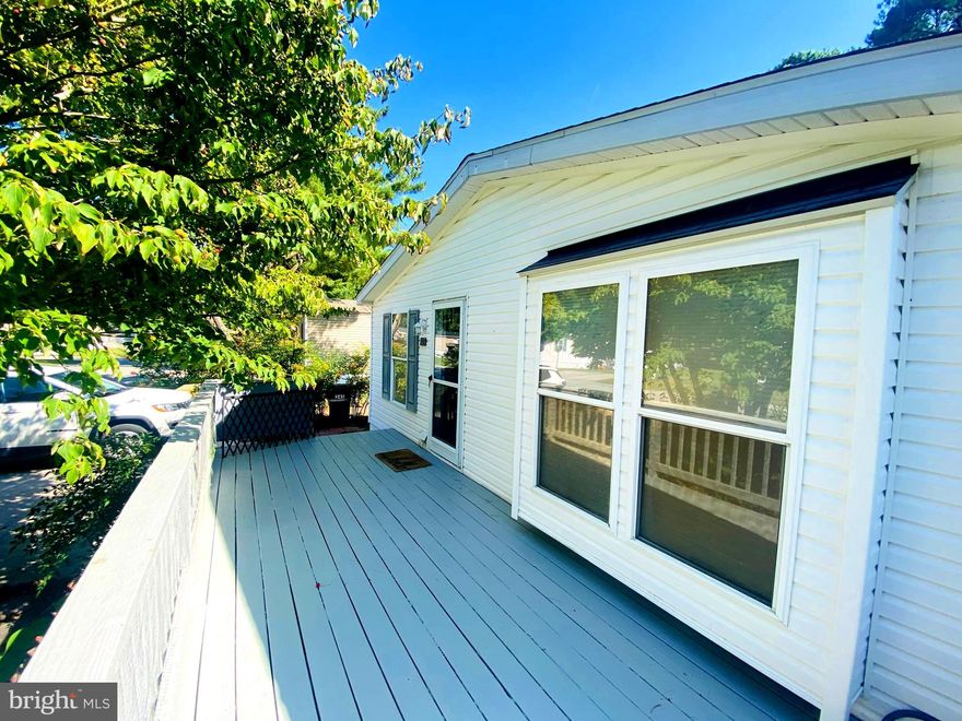 This well maintained home offers a large Living room, spacious  Eat-In Kitchen, Primary Bedroom with en-suite, 2 additional bedrooms, another Full Bathroom, and Laundry Room complete with washer and dryer.    The  Open Kitchen has a ton of Natural Light with abundant cabinetry for storage,  with a  Whirlpool gas stove and refrigerator.    New HVAC installed in 2022.  Outside you will find lush greenery that  has been thoughtfully placed to offer privacy and tranquility.  The  generous outdoor space features beautiful trees, shrubs and herbs surrounding the house.  There is a large 10 x 8 shed with new vinyl siding and metal roof.  Come see all this great home has to offer.  Simply complete an application with Southgate park before submitting an offer.  There are no rentals allowed in this park.  **House is being sold AS IS**