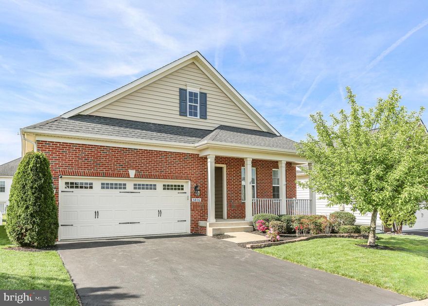 BEAUTIFUL Main Level Living in Virginia Heritage at Lee’s Parke!  Thoughtfully Designed Home with Comfort and Style in Mind!  3 Bedrooms, 3 Full Bathrooms with Finished Basement!  2.5 Tandem Car Garage!   Low Maintenance Covered Deck with extra wide steps to the backyard!  Easy to Maintain Wood Flooring!  Open Great/Living Room with Gas Fireplace!  Dedicated Dining Area!  Kitchen offers Wall Oven, Island for Extra Storage and Casual Dining, Granite Countertops, SS Appliances and Pantry!  Enjoy stylish Pendant Lighting above the Kitchen Island!  Primary En-Suite showcases 2-Walk-In Closets with Custom Closet Organizers, Remote Controlled Silhouette Blinds, Tray Ceiling with Ceiling Fan!  The Primary Bathroom is gracious in size where you can enjoy a Double Vanity with Extra Storage, Private Water Closet, Linen Closet, Separate Shower and Soaking Tub!    Finished Basement with Full Bathroom, Recreation Room PLUS Additional Space for Storage/Workshop Area!  Garage BONUS:  Motor Enthusiast's will love the Garage features - 2.5 car Tandem, Gladiator Cabinets, Epoxy Floor Covering!  Well-Manicured Lawn and Landscaping!  Lawn Irrigation System!  Community HIGHLIGHTS:  Award Winning 55+ Virginia Heritage is close to transportation, VRE, Commuter Lot, Shopping and Medical! HOA fee includes Verizon FIOS Internet & Cable and a Club House with 2 Pools, Exercise Room and much more!!