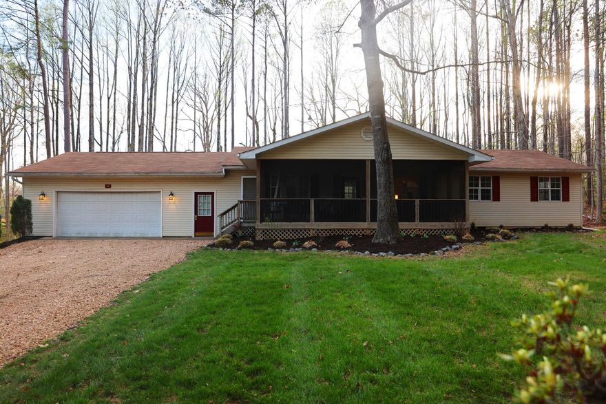 Get ready for lake living by summer! This 4-bedroom, 2-bath home has been updated with fresh paint throughout, new bathroom vanities, and vinyl flooring. The eat-in kitchen features stainless steel appliances and an island, perfect for everyday living and entertaining. Step out onto the back deck, ideal for grilling and enjoying the warmer months, overlooking a partially fenced backyard. Relax on the screened-in front porch with your morning coffee or unwind in the evenings. Conveniently located near community lake access, offering a picnic pavilion, boat ramp, and tot lot. Don’t miss this opportunity to make this your lake home!