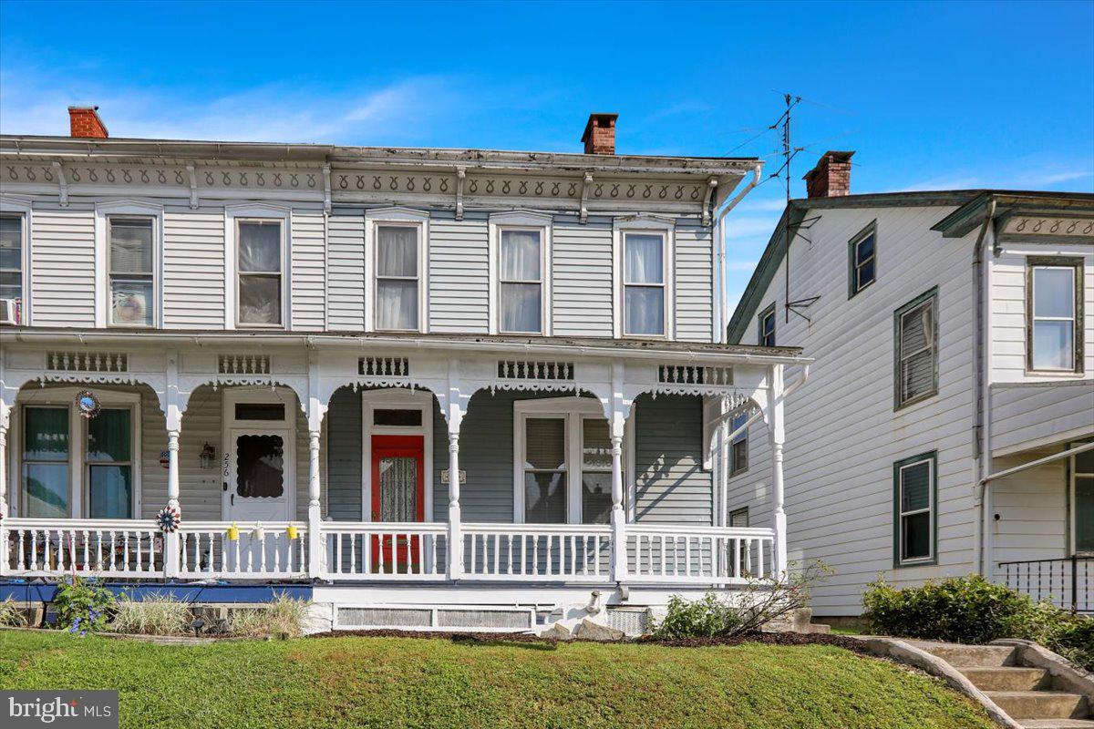 Welcome to this spacious Victorian-style semi-detached home, offering nearly 2,000 sq. ft. of living space in the heart of quaint Kutztown. Featuring 5 bedrooms and 2 full bathrooms, this property combines old-world charm with modern updates. Inside, you’ll find hardwood floors, fresh paint, and a flexible floor plan with potential to reconfigure to suit your needs. The new boiler (2023) ensures peace of mind, while the convenience of second-floor laundry adds a modern touch. Multiple covered porches and balconies invite you to relax outdoors, whether enjoying your morning coffee or evening sunsets. Practical features include private off-street parking at the rear of the home, all appliances included, plus a one-year home warranty with an acceptable offer. Located just steps from Kutztown Park, shopping, and dining, this property offers a walkable lifestyle in a fantastic community. Don’t miss your chance to own a piece of Kutztown’s history with space, character, and modern comforts all in one!