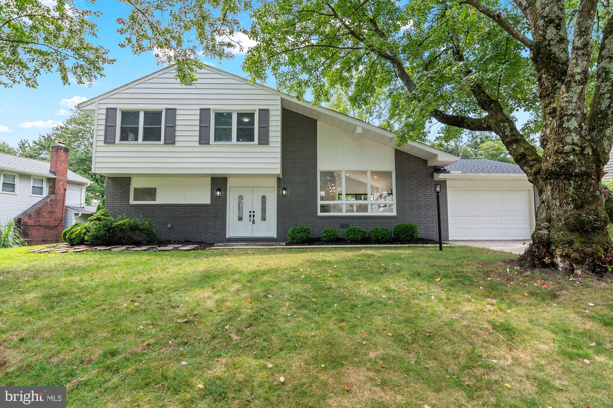 Coming Soon!p Amazing total renovation on this Towson split level home! Large open floorplan with three bedrooms and two full baths on the upper floor. Middle floor has gourmet kitchen with island, stainless appliances and tile backsplash, sliding doors to rear deck, plus living room and dining room with vaulted ceilings. Also has entry to garage from dining room. The main level has entrance foyer, half bath, family room with fireplace, laundry room, another large bedroom suite with full bathroom. Essentially two primary bedroom suites for lots of possibilities - in law suite, etc. One car attached garage, off street parking, good sized lot. All in the most convenient Towson location, just off 695.