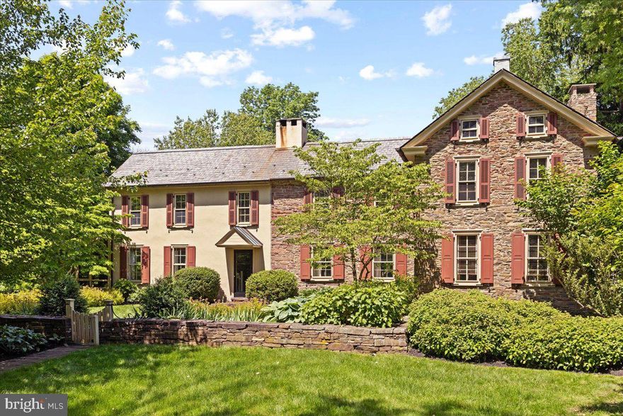 For the first time in over 50 years this tranquil retreat with all the elements one needs for an upscale country lifestyle, comes to market. Tucked away in Hilltown Township, Brook Hollow Farm epitomizes the Bucks County farm estate. Accessible via two entrances, the house is hidden from the road and situated on 15.4 acres, assuring privacy. Enjoy a slice of English countryside with a mid-18th-century stone manor house at its center. Views from the four-bedroom house are enchanting in every season. The main residence and barn date back to 1750 and have been researched and documented by the Heritage Foundation in Doylestown, PA. While its original sections offer a traditional floorplan with a formal living and dining room, later additions are designed to take advantage of the views and indoor-outdoor flow for warm weather entertaining. The formal living room is bright and airy with 8 windows and double glass doors to the outside along with a mantled fireplace. The formal dining room boasts a huge walk-in fireplace with Bee Hive baking oven inside.  The family room is lined in windows and has French doors that open to a large slate patio with pasture and stream views. Ever-blooming gardens come to life each Spring and provide color all season. A rich bookshelf lined library with glass doors opens to a solarium overlooking the pond and pastures. The open country kitchen with island has custom pine cabinets and top of the line designer appliances. The kitchen opens to the warm and inviting family room will walls of windows, wood burning fireplace, and a casual dining area well designed for entertaining. Private quarters include four bedrooms and 3 baths. The main bedroom suite provides a large sitting are with gas fireplace, office space, his and her walk-in-closets, and updated bath with radiant heat floors, soaking tub and shower. There is pumpkin pine floors throughout the house and door hardware is solid brass by Ball & Ball. Additionally, this pristine setting includes an 8’ deep spring fed pond with fountain and stone spring house sitting next to the Pleasant Spring Creek. Most of the 15.4 acres is fenced for horses and includes professional hard scape of dry laid stone retaining walls and PA slate patios. The large bank barn was originally constructed in 1798. The ground floor is 900 SF of open space with the same above with 25’ height ceiling for storing or events. The horse stable has 6 oversized stalls with matts, Dutch doors, stacked stone wall fronts, and wash stall w hot water. Second floor is open for hay storage. The Care-Takers apartment is lovely and very livable with 2 beds 1 bath, living room, dining room and kitchen. The level below the apartment has a tack room and powder room/laundry room which services the horse barn. There is a 4-bay garage includes 3 10x20 parking bays and 1 10x30 bay with sliding door for an RV or tractor. Both the garage and home have central vacuum systems. Additionally, there are three run-in sheds for horses or livestock and a 900 SF maintenance building for tractors and tools. This property has been an active working horse farm until 1995 and all associated amenities have been carefully maintained and are fully operational. This home offers easy access to many area attractions. The farm is 2 hours to NYC, 1 hour to Philadelphia, minutes to Philly train stations and surrounded by sought after farm to table dining and shopping.