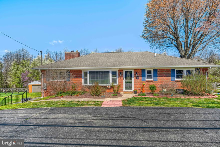 Welcome to this spacious and beautifully-updated rancher, ideally located in the heart of Bel Air.  This true 4 bedroom, 2.5 bathroom home offers the perfect blend of modern updates, comfort and space (over 2,725 square feet of finished living space).   Step inside and you'll immediately notice the fresh LVP flooring throughout the main level.  The sun-drenched living room opens to the dining room with brick, wood-burning fireplace to add charm and warmth to the space.   Continue into the expansive gourmet eat-in kitchen with premium Dekton countertops, custom tile backsplash and enough space to move around freely.  The rear kitchen door steps out onto a covered porch and large wood deck installed in 2020.  There is an updated half bath is just off of the kitchen.  Walking down the hall, you're greeted by 3 spacious bedrooms and a fully updated hall bathroom with modern pizazz!  Downstairs to the lower level, the stunning primary bedroom suite awaits!  Featuring a dreamy primary bathroom with separate soaking tub, walk-in shower and spectacular tile work throughout.  Primary bedroom also boasts a large walk-in closet, recessed lights and a new ceiling fan.   The basement level is rounded out by a bright Den with outside access, laundry room and plenty of storage.   Outback, a greenhouse highlights the rear yard, situated next to a garden of raised beds with sturdy metal fencing surrounding.   Backing to woods, a fenced rear yard offers the perfect place to unwind and enjoy this nearly half acre lot.  A detached 2 car garage with electric, rounded driveway in the front and large parking area along the side ensure plenty of parking for your and your guests.  Updates Include:  AC in 2023, LVP Flooring 2023, Half Bath Remodel 2020, Garage Door 2021,  Dekton Coutertops 2021, Primary Suite in 2018.  Convenient to the areas finest dining and shopping, you do NOT want to miss this one!  Schedule your showing today!