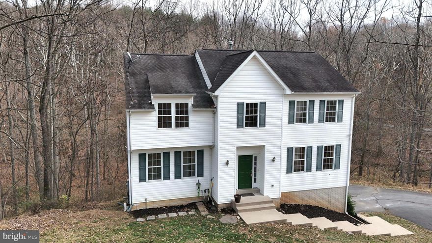 Discover this stunning custom-built retreat, beautifully set on a lush approx. 3-acre wooded parcel just minutes from downtown Lovettsville. This exquisite three-level residence offers 5 spacious bedrooms and 3.5 baths, recently refreshed with professional painting throughout and brand-new carpeting and luxury vinyl flooring to add a touch of elegance.

Relish the peace and privacy of nature from your expansive wood deck, or step through the newly installed custom exterior doors to enjoy the seamless blend of indoor and outdoor living. This home combines tranquility with connectivity, equipped with high-speed Saratoga internet, perfect for remote work, streaming, and keeping in touch. Ideal for those seeking a serene lifestyle without sacrificing convenience—this home truly has it all!